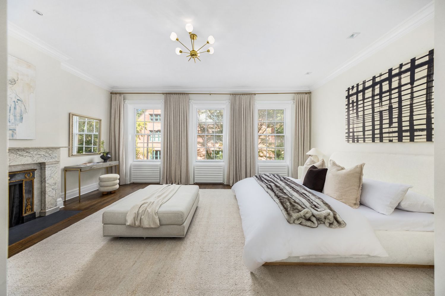 a bedroom with a bed and a couch