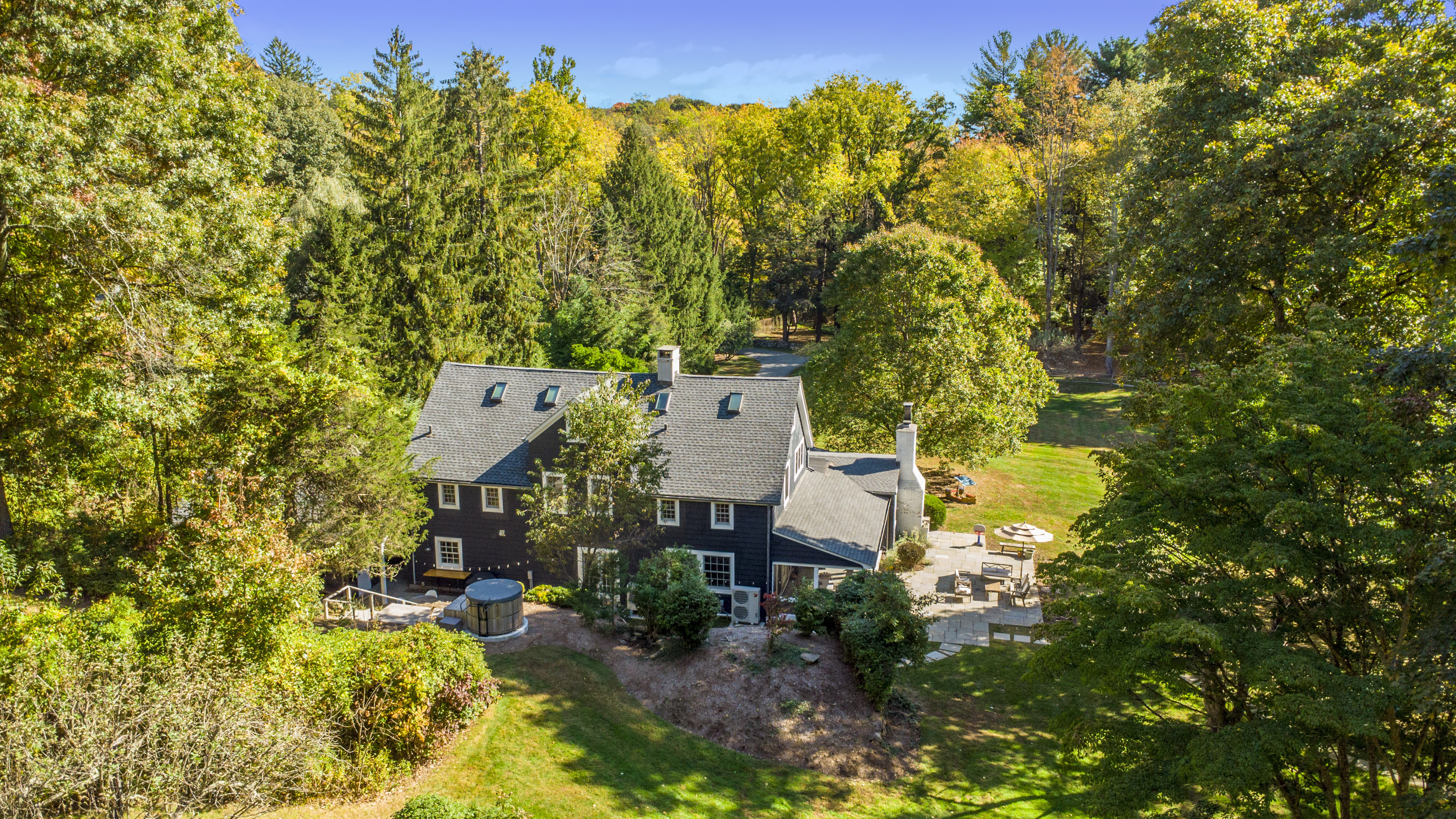 41 Harris Road Katonah, NY 10536 - Photo 38 of 48 view of a house with a yard and sitting area