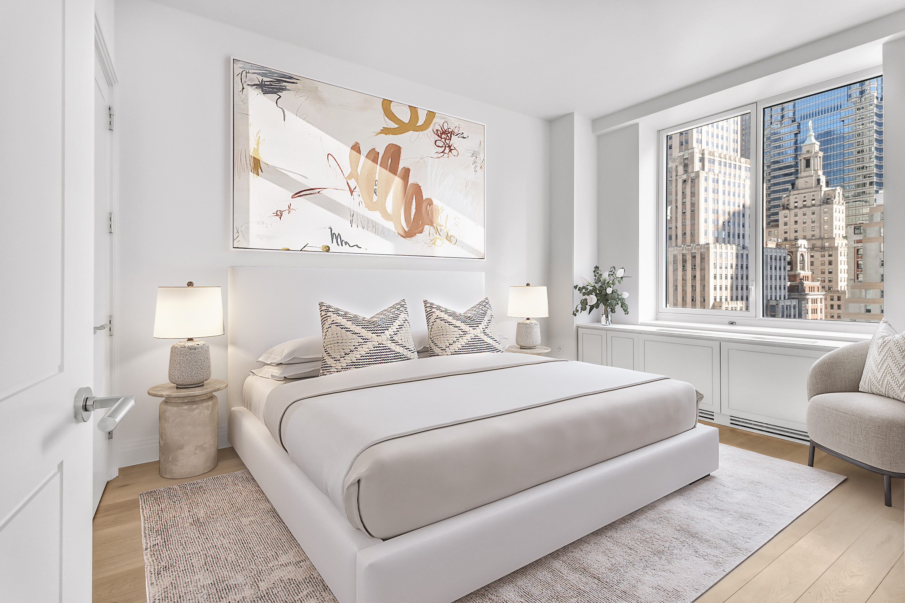 1 Wall Street, Unit 2512 Manhattan, NY 10005 - Photo 7 of 31 a bedroom with a bed and a large window