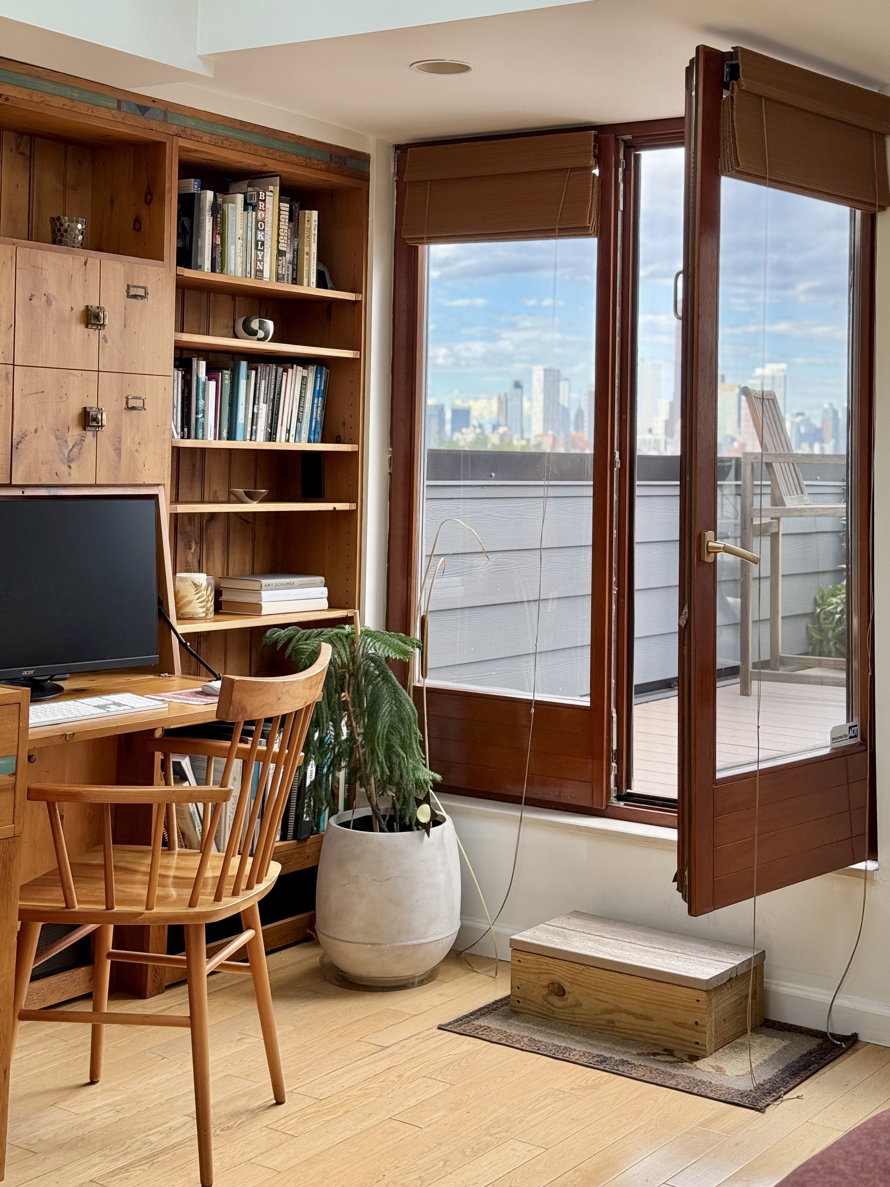 394 12th Street, Unit 5 Brooklyn, NY 11215 - Photo 11 of 14 a dining room with furniture and a potted plant