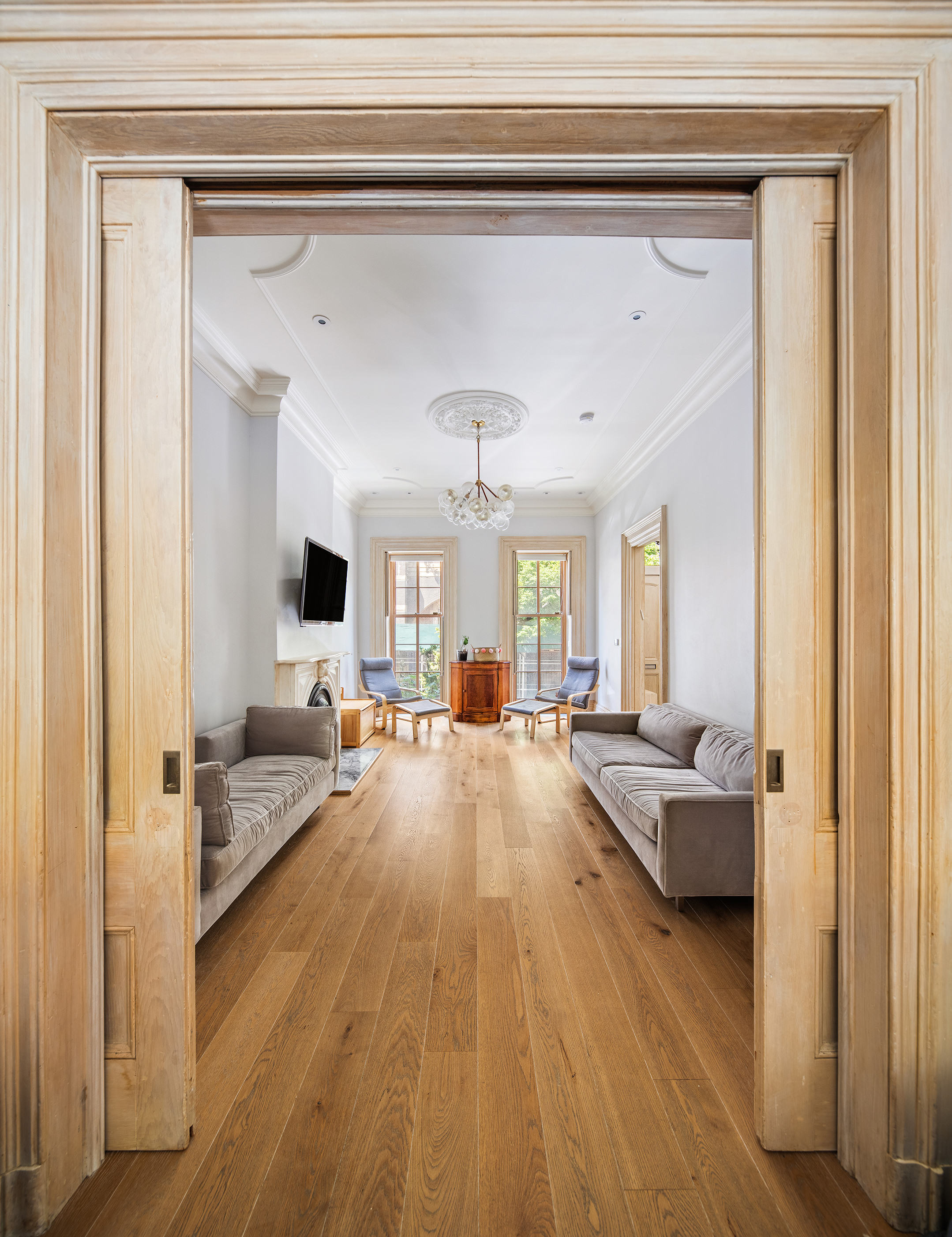 137 St Felix Street Brooklyn, NY 11217 - Photo 2 of 18 a living room with furniture and a flat screen tv