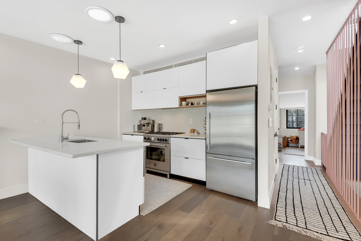 541 Madison Street, Unit 4 Brooklyn, NY 11221 - Photo 3 of 9 a kitchen with stainless steel appliances a refrigerator a sink and a stove top oven