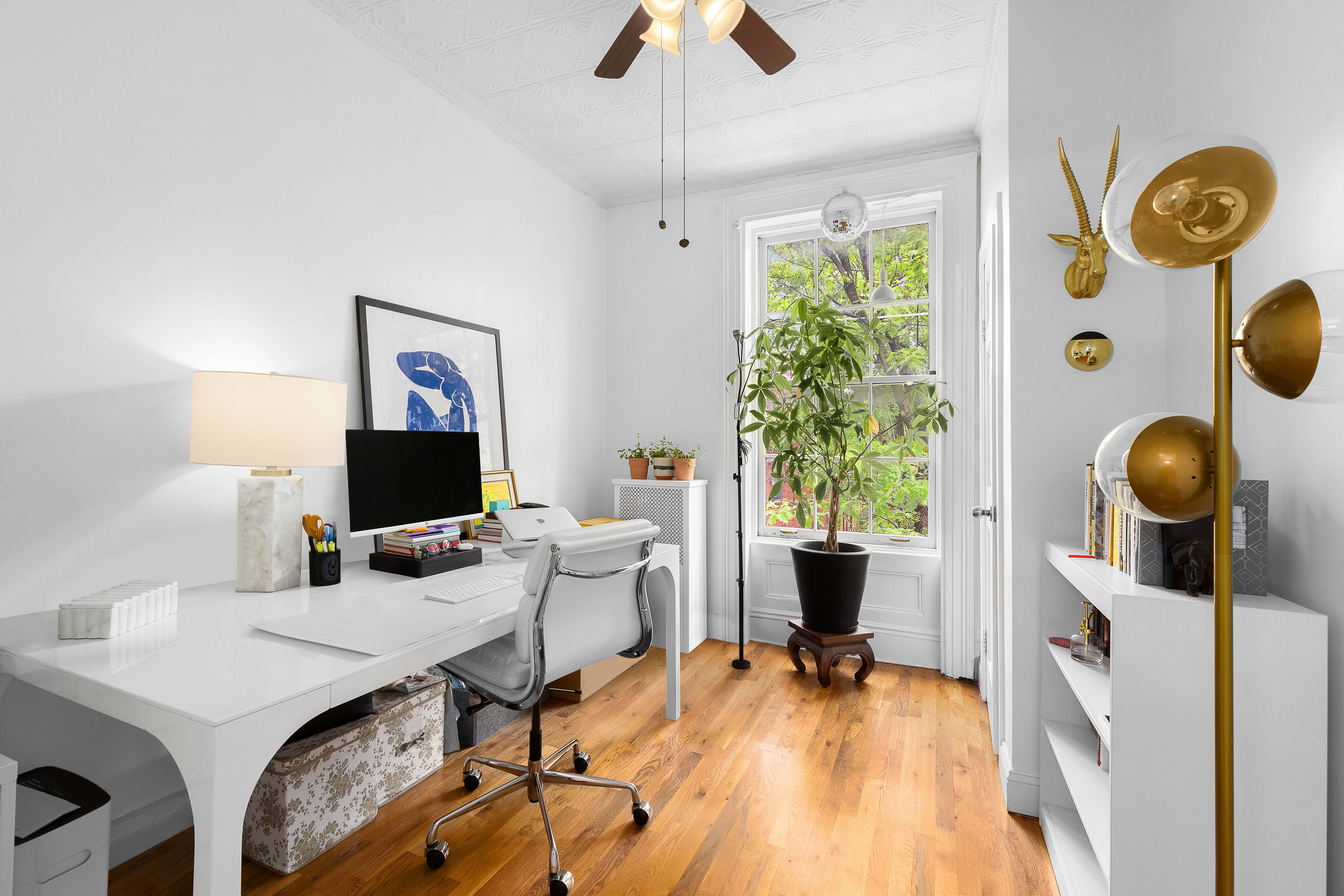 144 Baltic Street Brooklyn, NY 11201 - Photo 10 of 14 a view of a workspace with furniture and a window