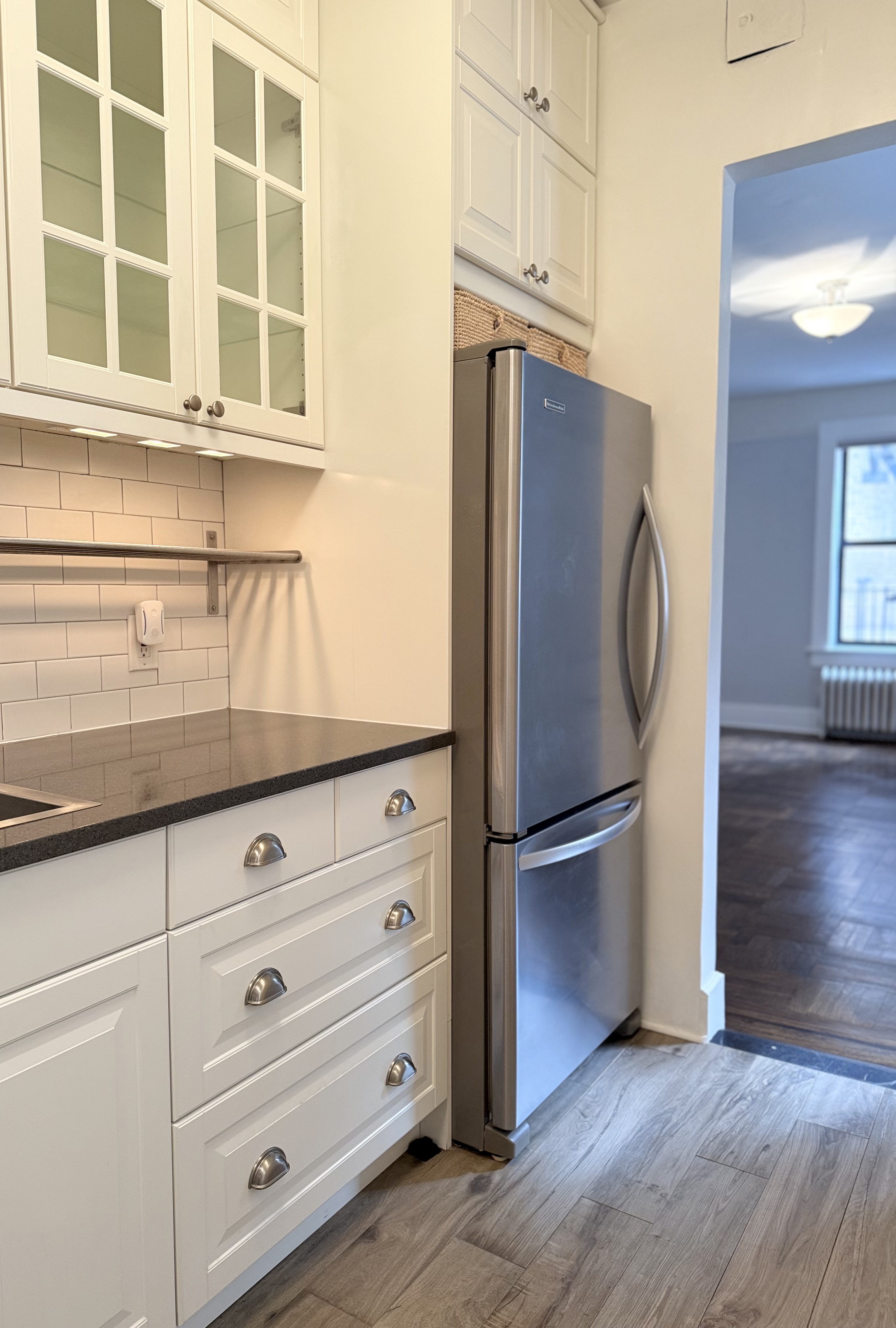 371 Fort Washington Avenue, Unit 4B Manhattan, NY 10033 - Photo 4 of 14 a kitchen with stainless steel appliances granite countertop a refrigerator and a sink