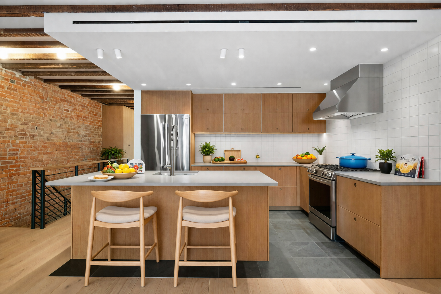 269 MacDonough Street, Unit GARDEN Brooklyn, NY 11233 - Photo 2 of 7 a kitchen with stainless steel appliances kitchen island granite countertop a table chairs sink and cabinets