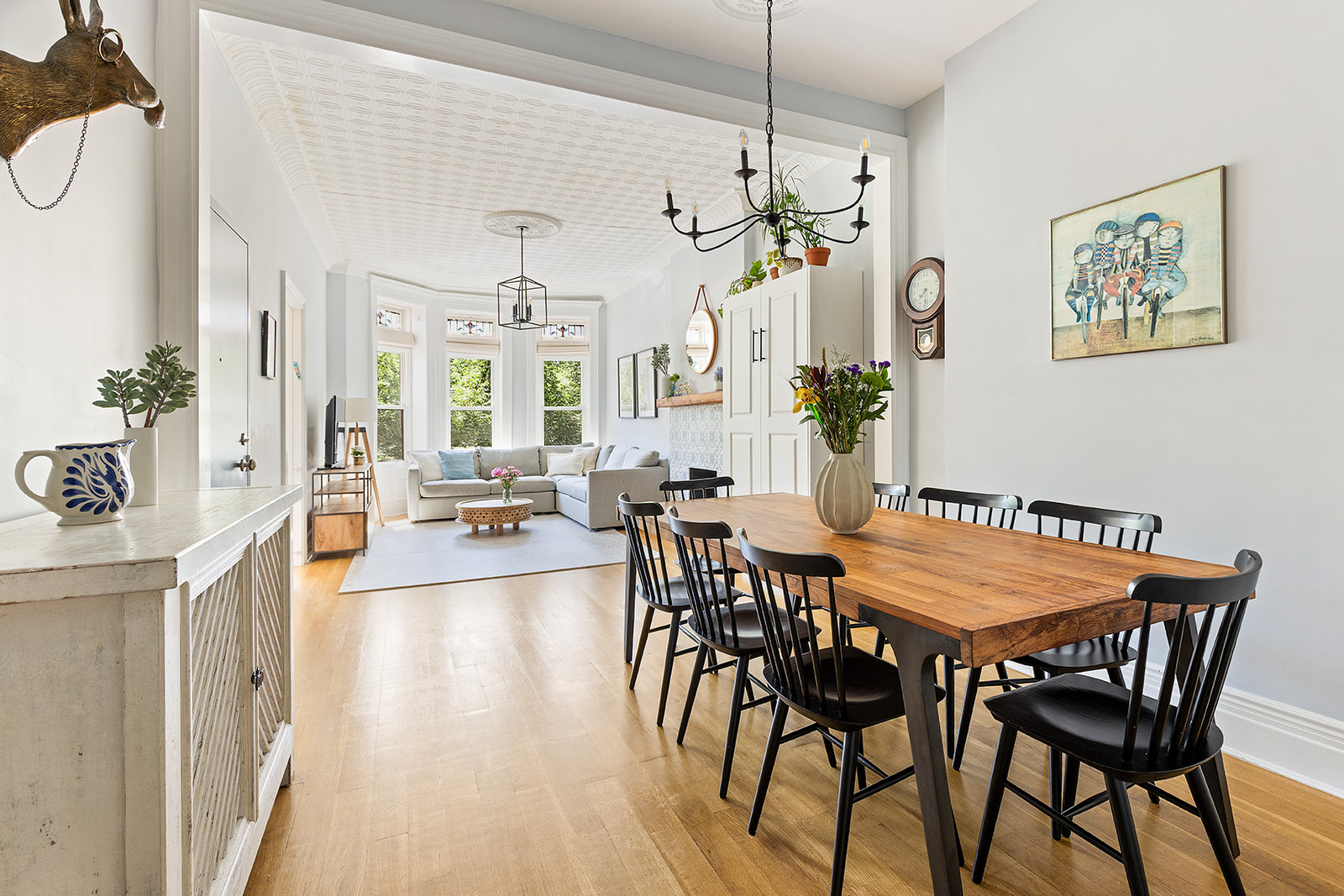160 Prospect Park West, Unit 2 Brooklyn, NY 11215 - Photo 2 of 12 a view of a dining room with furniture and wooden floor