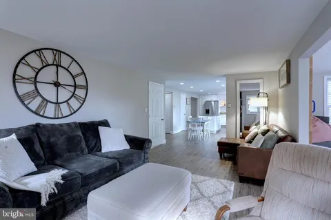 a living room with furniture and a couch