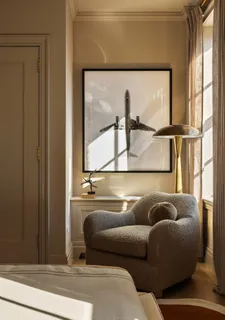 a living room with a couch and a large window