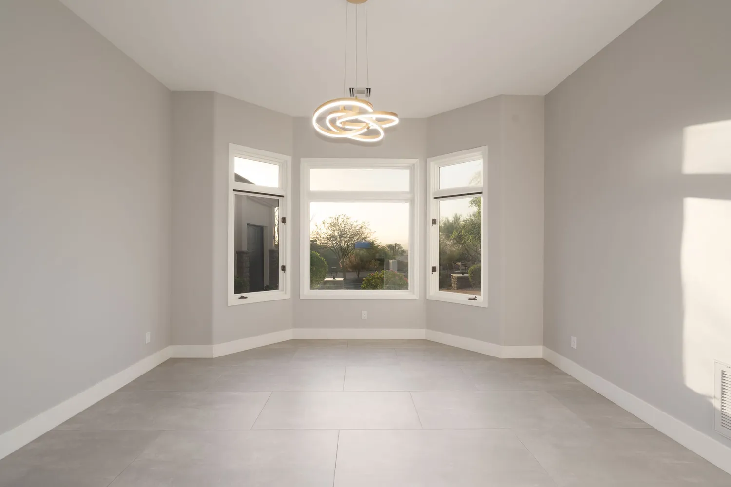 an aerial view of residential houses and outdoor space