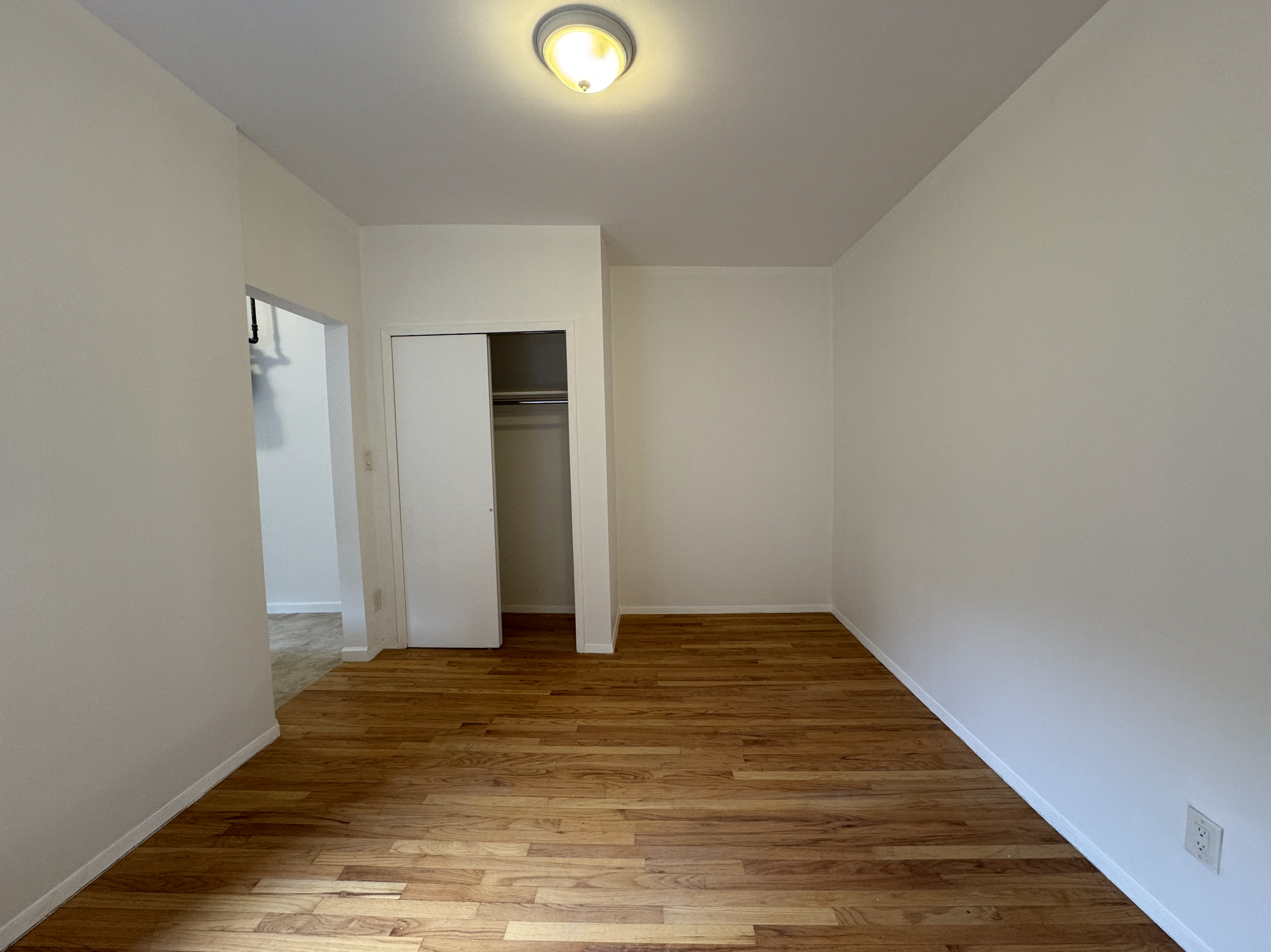 451 West 44th Street, Unit 63 Manhattan, NY 10036 - Photo 9 of 31 a view of an empty room