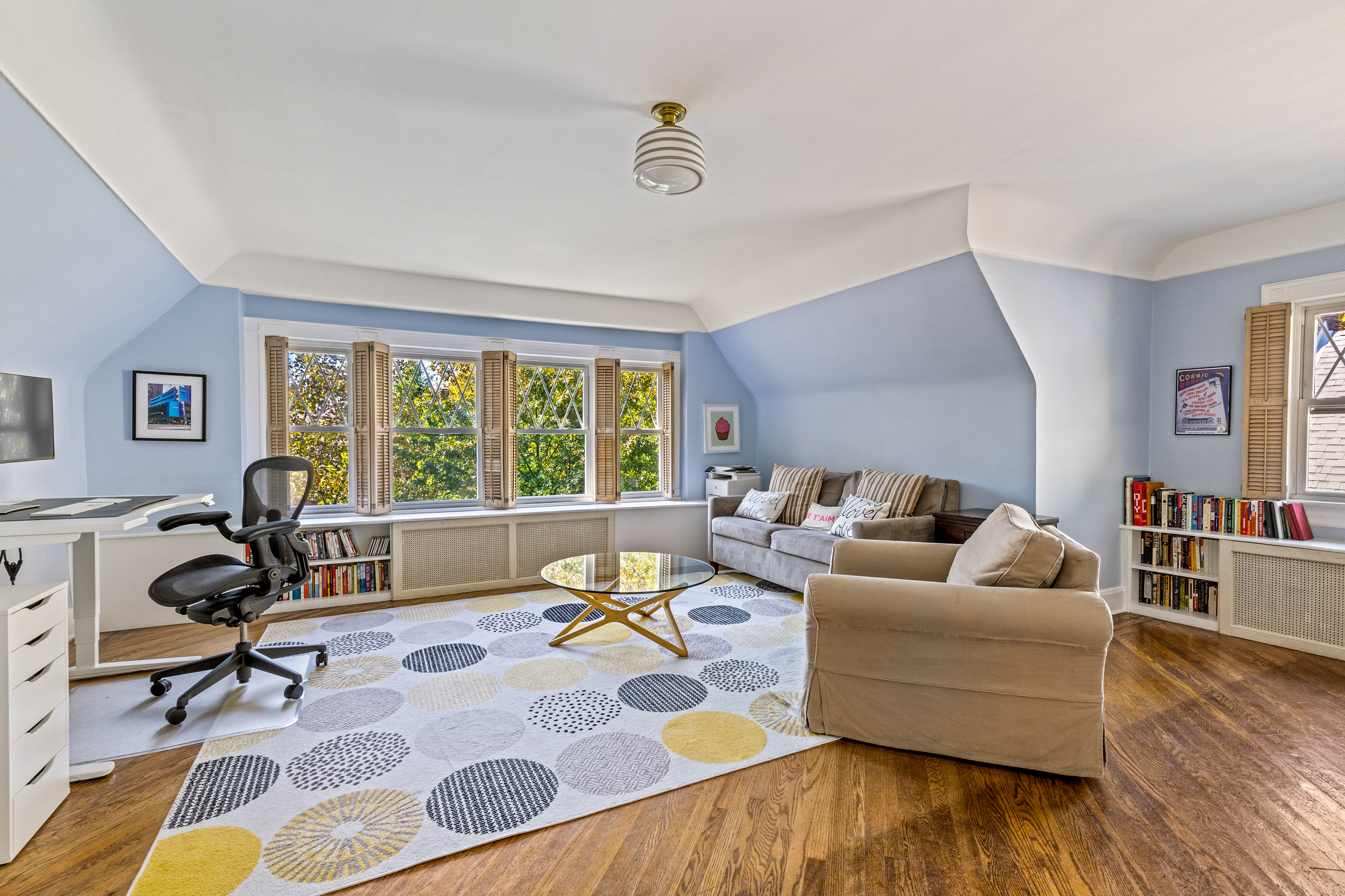 689 East 17th Street, Unit TWNHSE Brooklyn, NY 11230 - Photo 19 of 26 a living room with furniture and a table