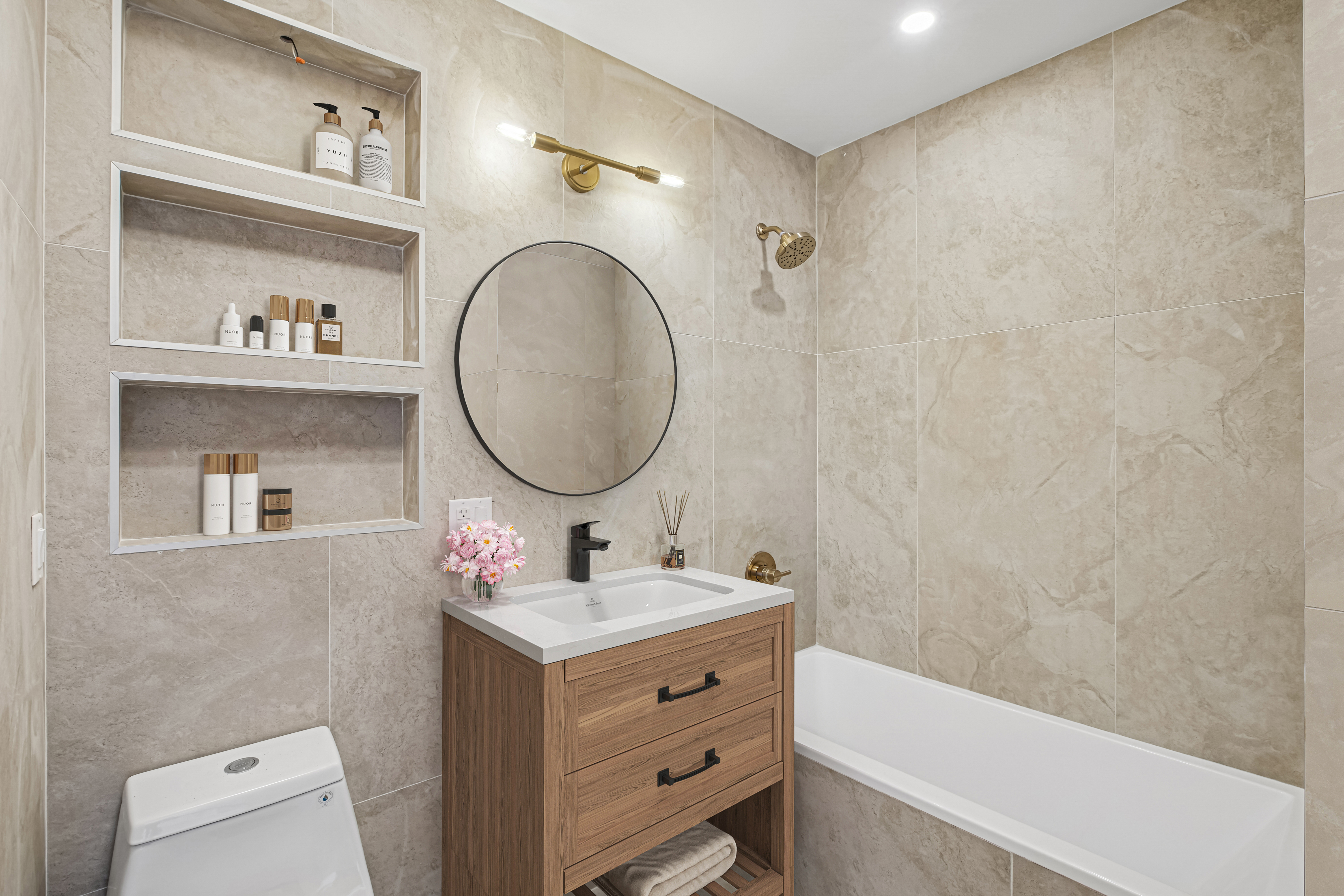 35 Jewel Street, Unit 1 Brooklyn, NY 11222 - Photo 9 of 11 a bathroom with a sink mirror vanity and toilet