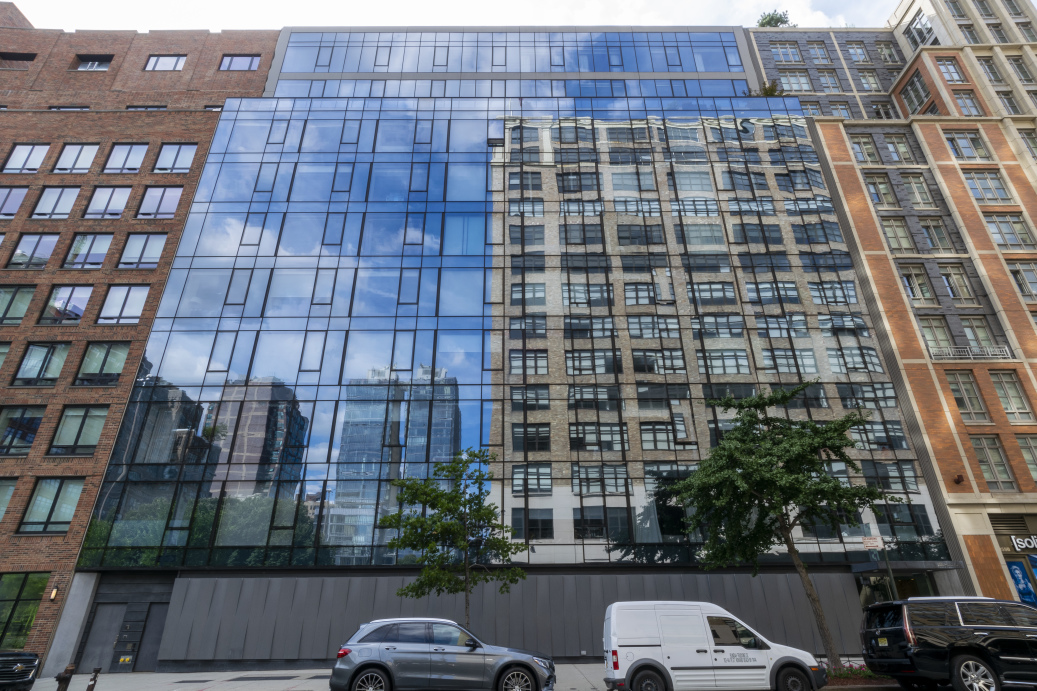 255 Hudson Street, Unit 9C Manhattan, NY 10013 - Photo 17 of 19 a view of a building