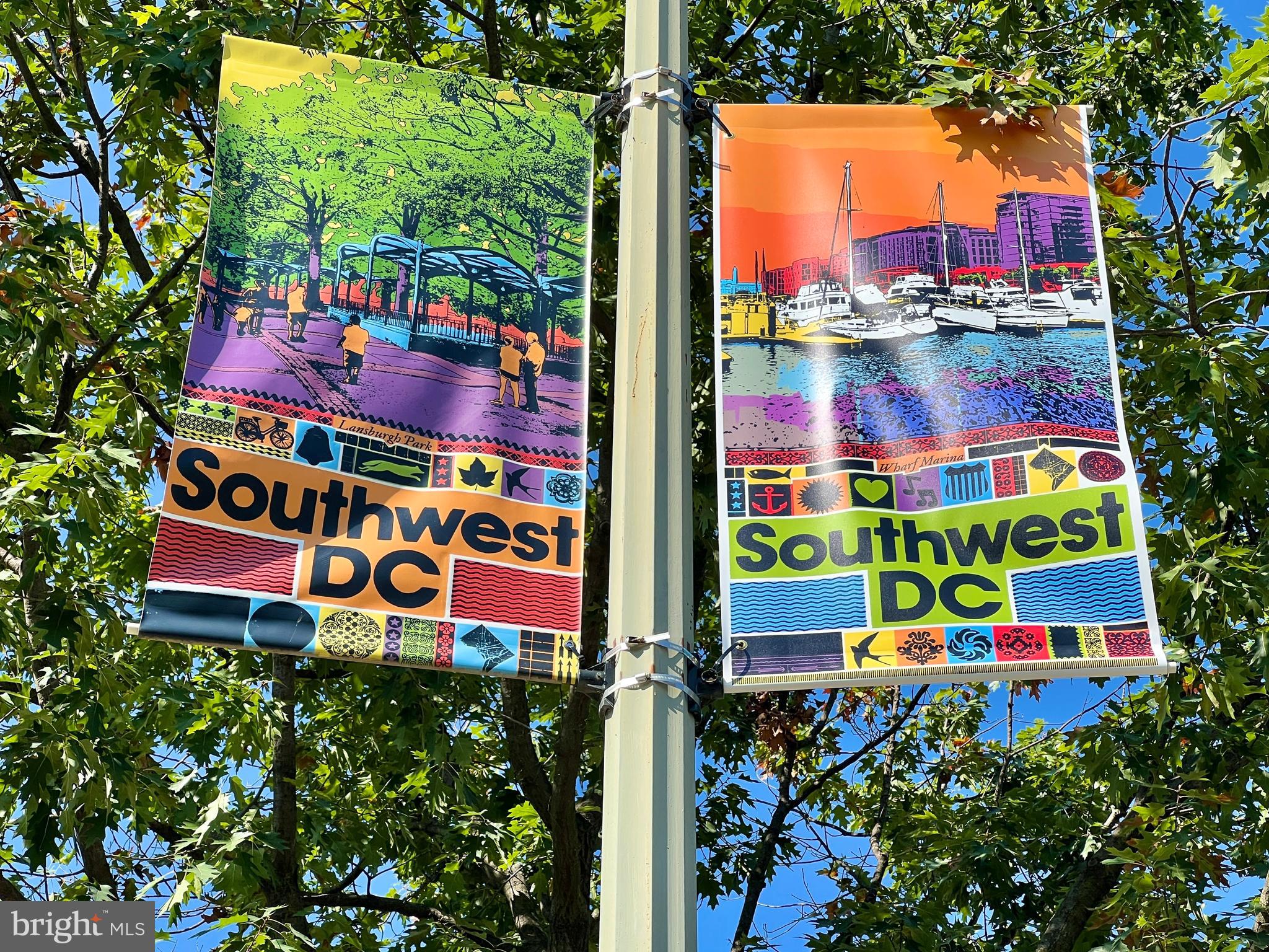 520 N Street Southwest, Unit S112 Washington, DC 20024 - Photo 42 of 45 an aerial view of multi story residential apartment building with yard and outdoor seating