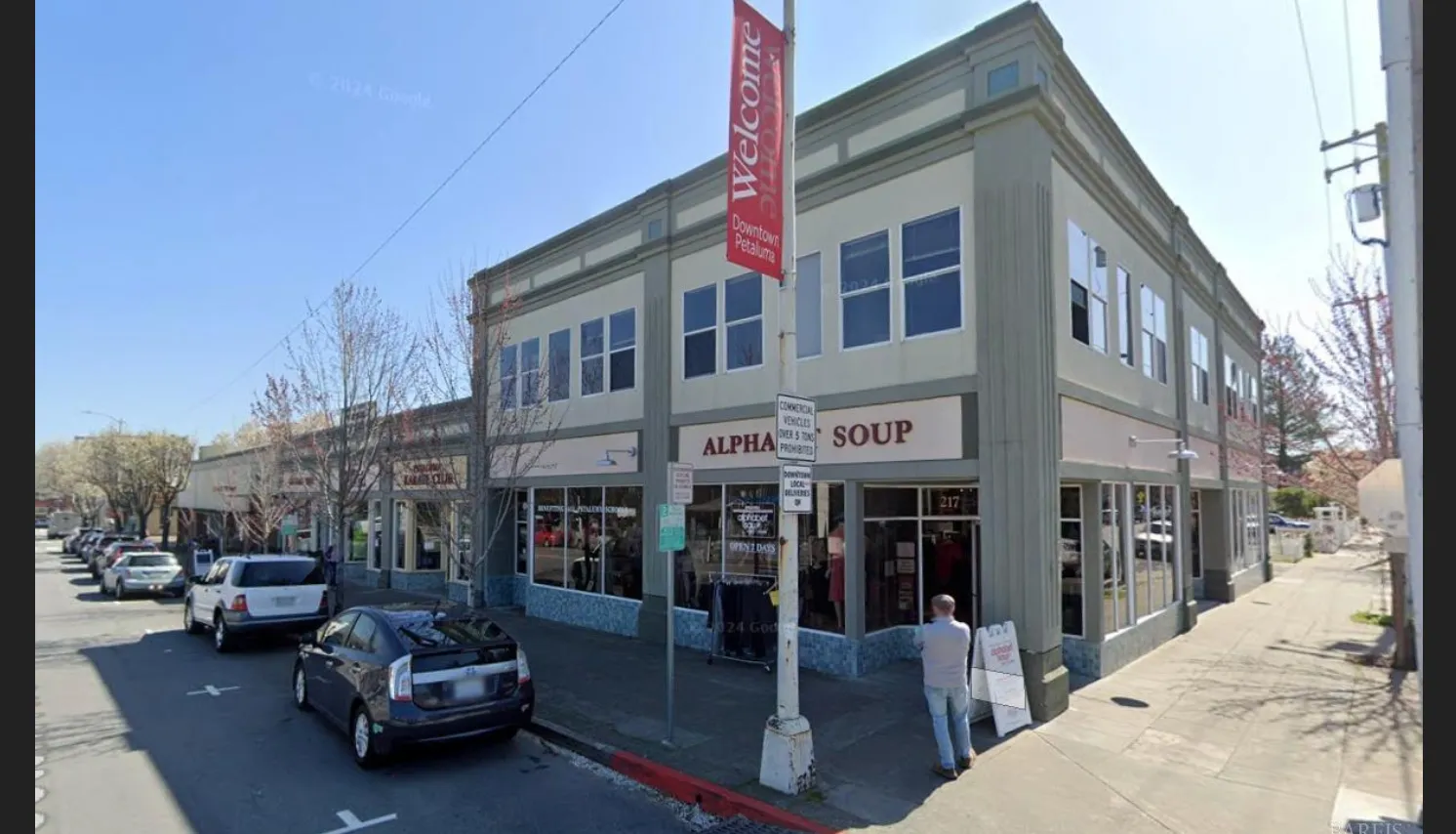 a view of a building with sitting area