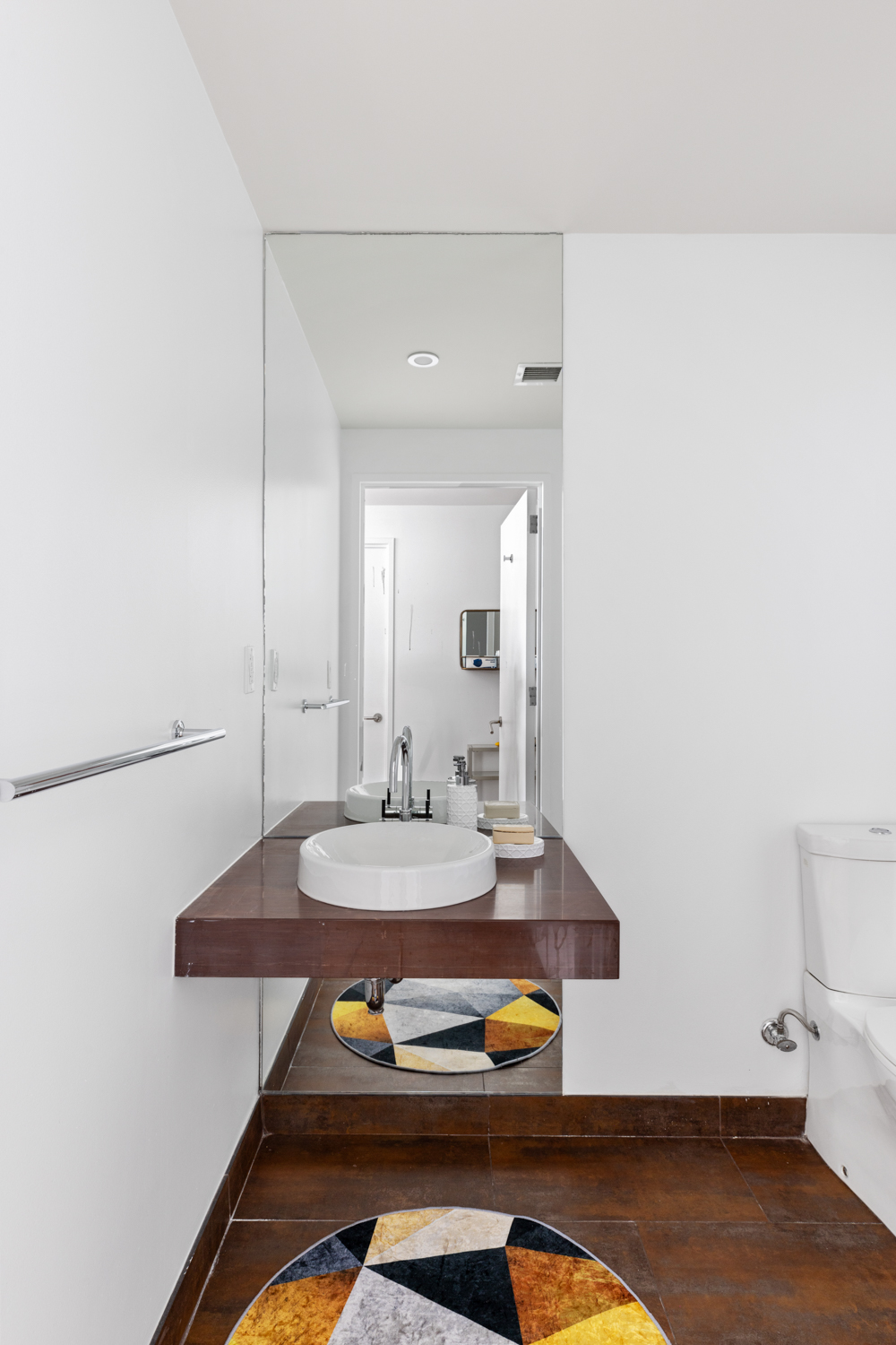 2 Northside Piers, Unit 25P Brooklyn, NY 11249 - Photo 16 of 26 a bathroom with a sink and a mirror