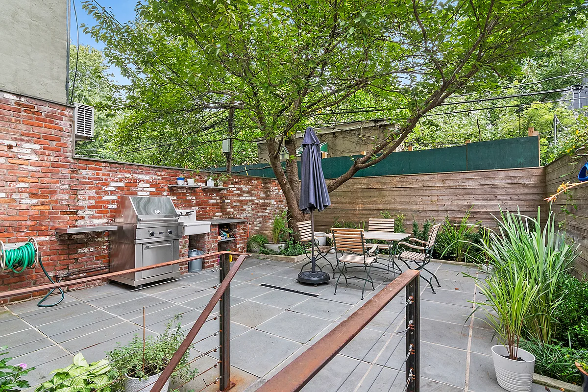 87 Monroe Street, Unit 1 Brooklyn, NY 11216 - Photo 1 of 11 a view of deck with patio