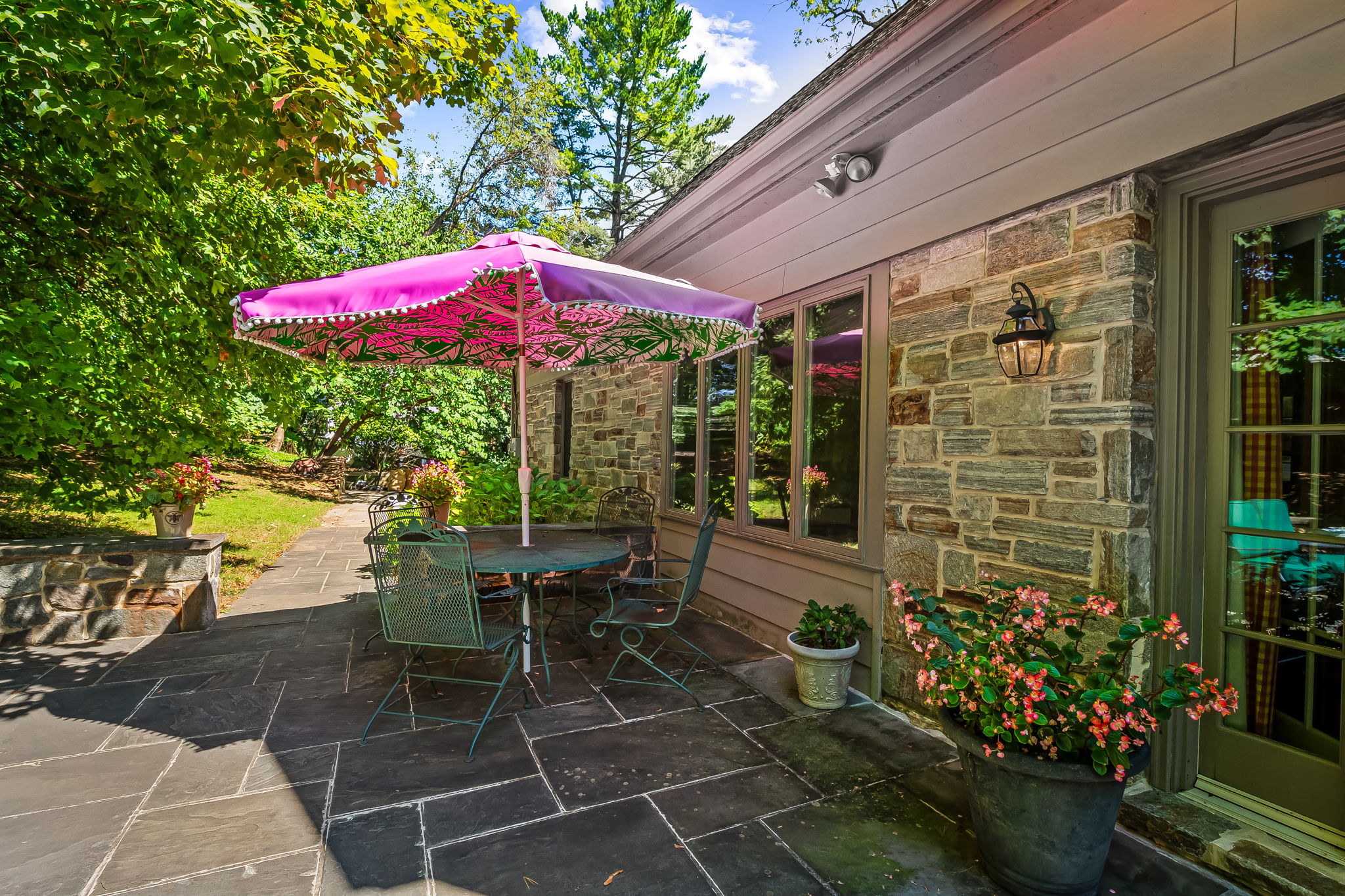 910 Army Road Towson, MD 21204 - Photo 53 of 62 a view of a patio with table and chairs potted plants