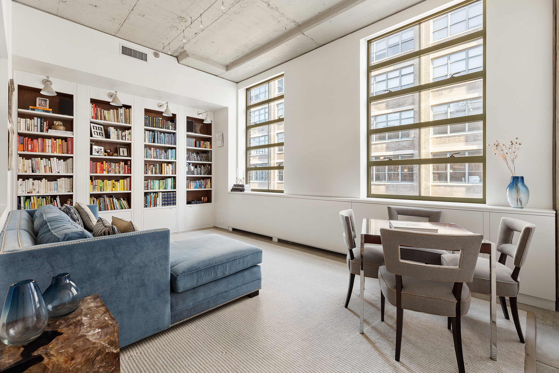 195 Hudson Street, Unit 6A Manhattan, NY 10013 - Photo 8 of 15 a living room with furniture and a window