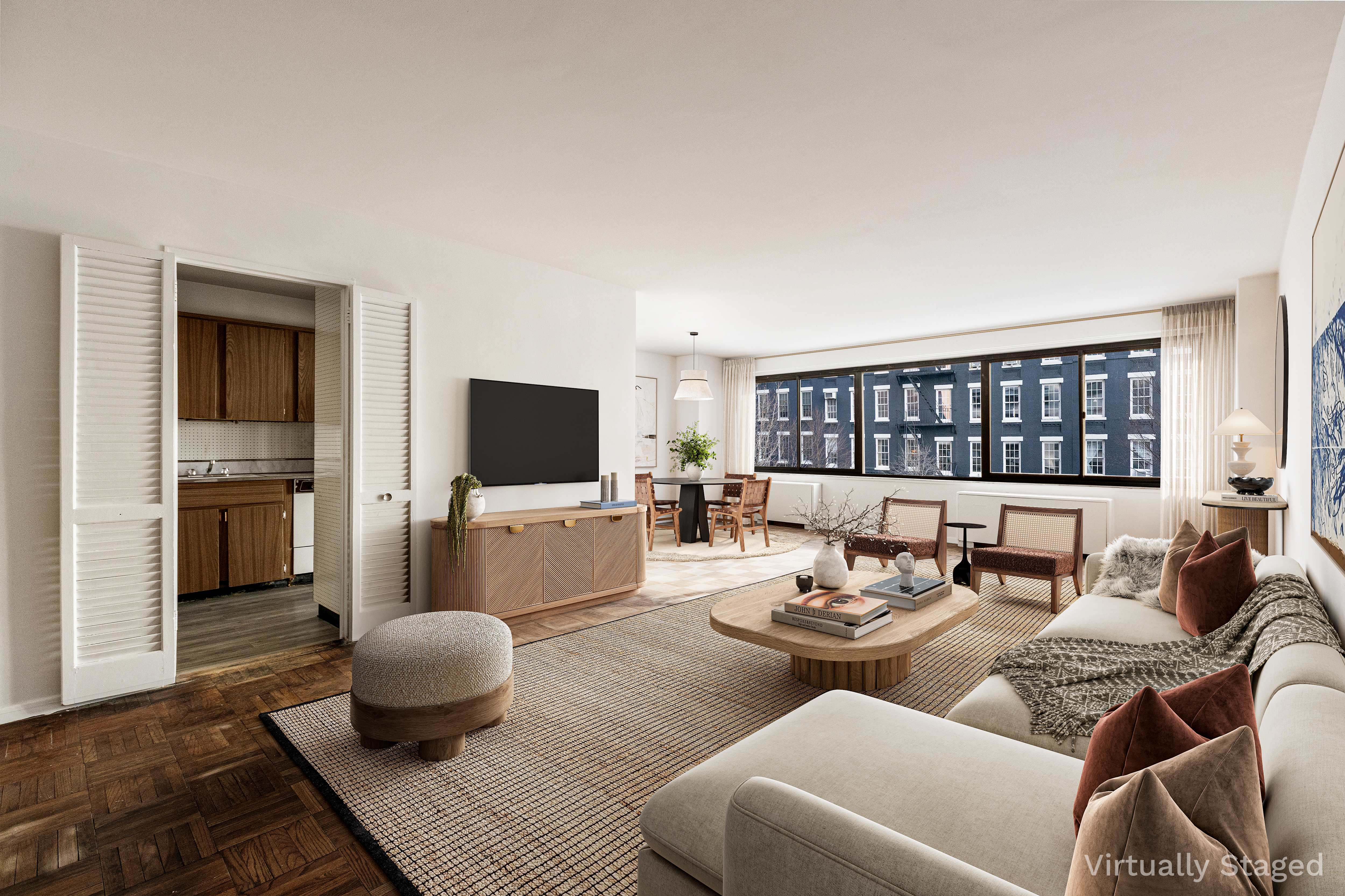 a living room with furniture and a flat screen tv