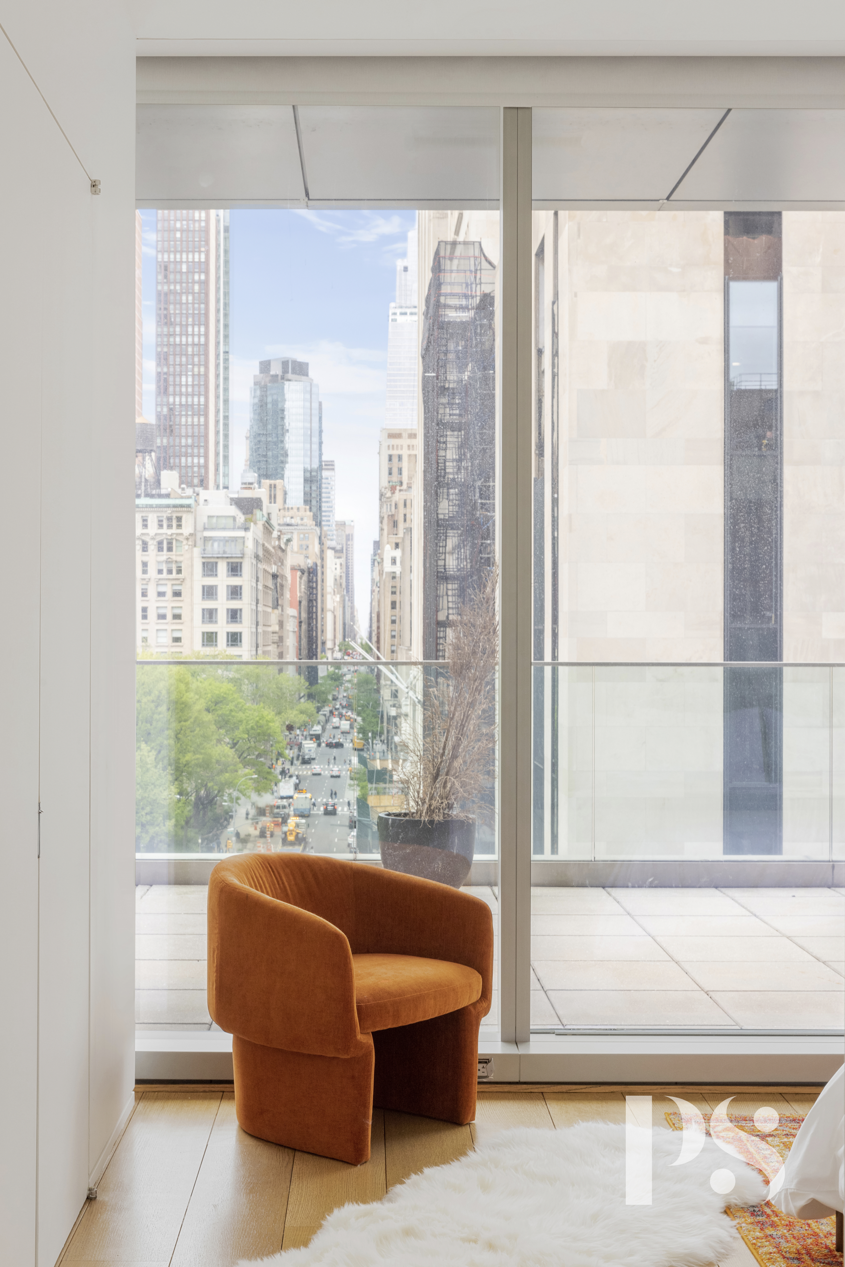 23 East 22nd Street, Unit 8A Manhattan, NY 10010 - Photo 10 of 25 a living room with furniture and a window