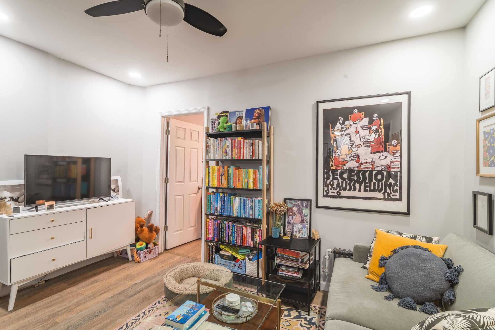 43 Underhill Avenue, Unit B2 Brooklyn, NY 11238 - Photo 5 of 10 a living room with furniture and a flat screen tv