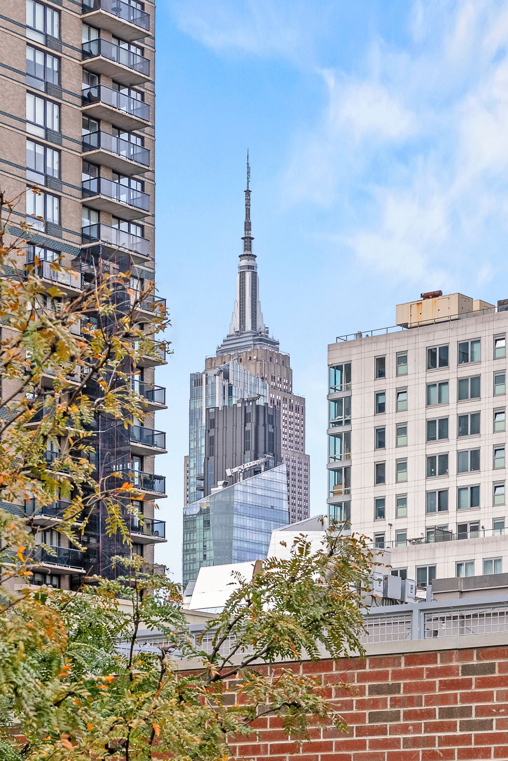 207 East 21st Street, Unit 6E Manhattan, NY 10010 - Photo 11 of 12 a view of a large building