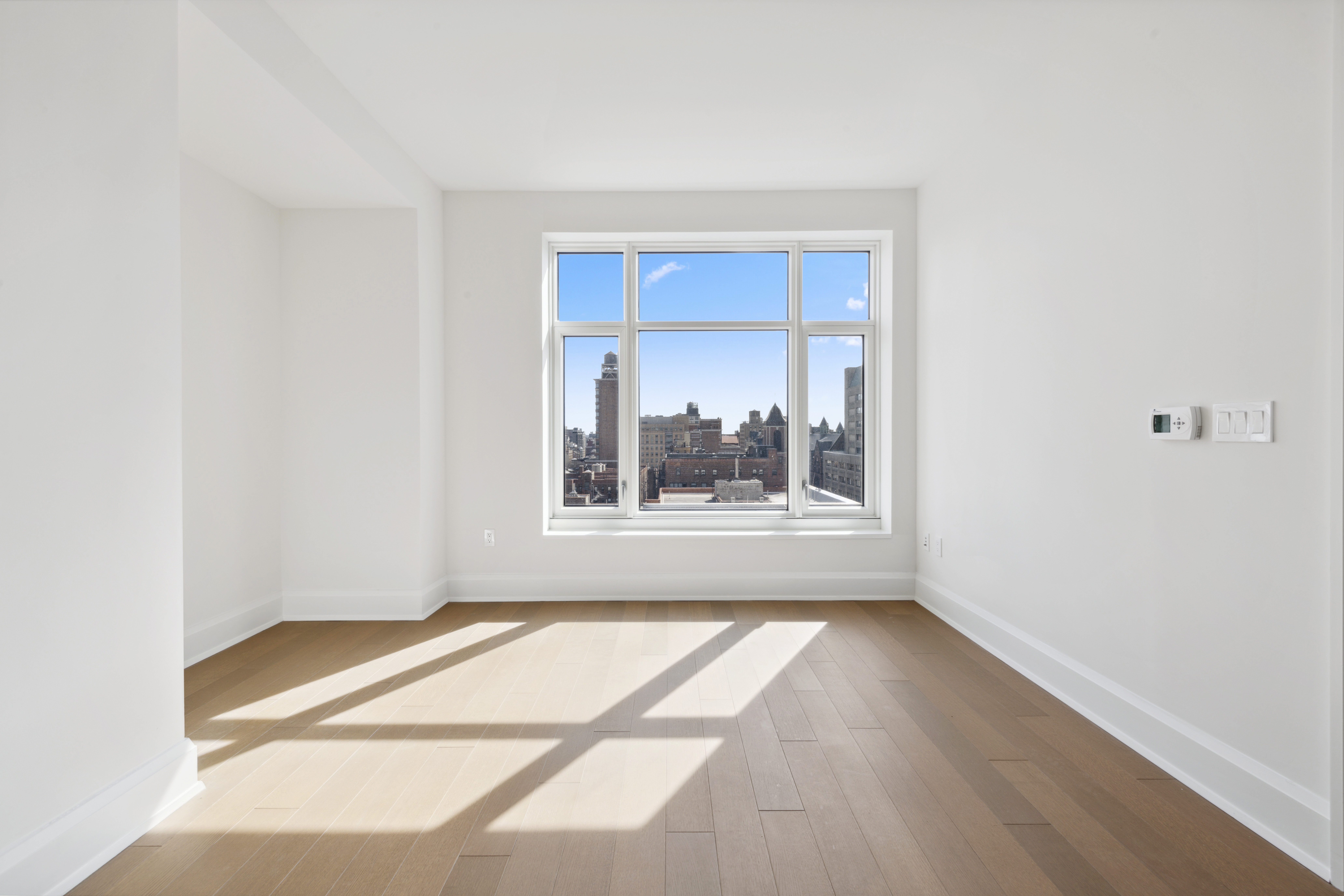 100 Claremont Avenue, Unit 10D Manhattan, NY 10027 - Photo 2 of 11 a view of a room that has a window in it