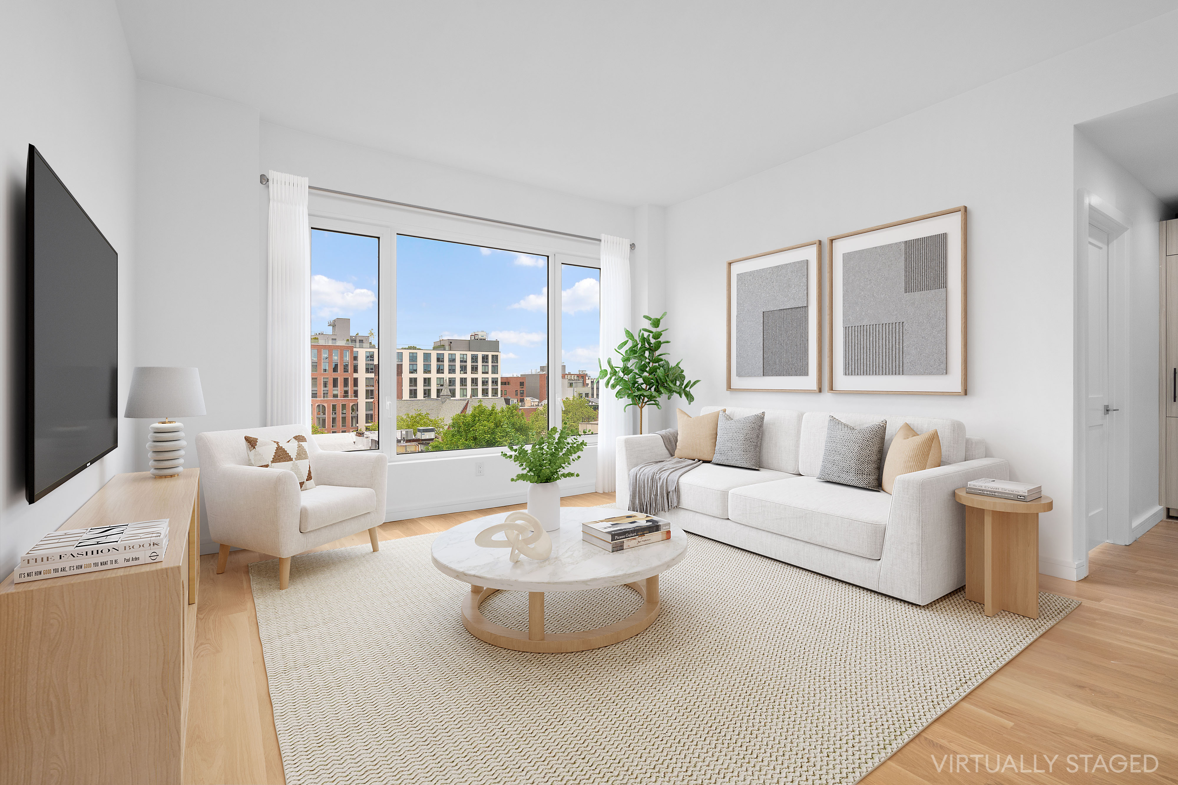 927 Atlantic Avenue, Unit 7A Brooklyn, NY 11238 - Photo 2 of 16 a living room with furniture and a flat screen tv