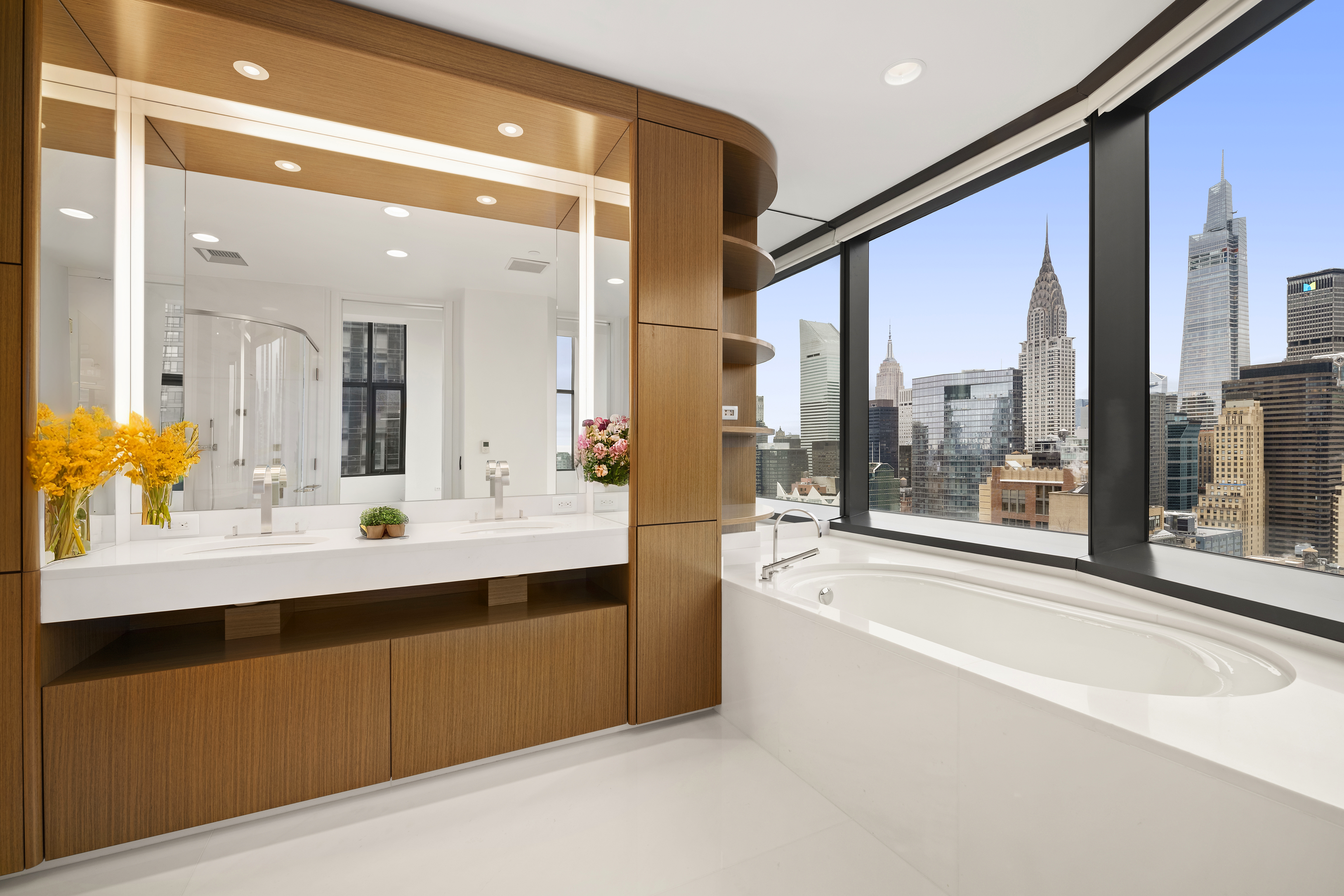 50 United Nations Plaza, Unit 34B Manhattan, NY 10017 - Photo 8 of 17 a bathroom with a bathtub and a sink