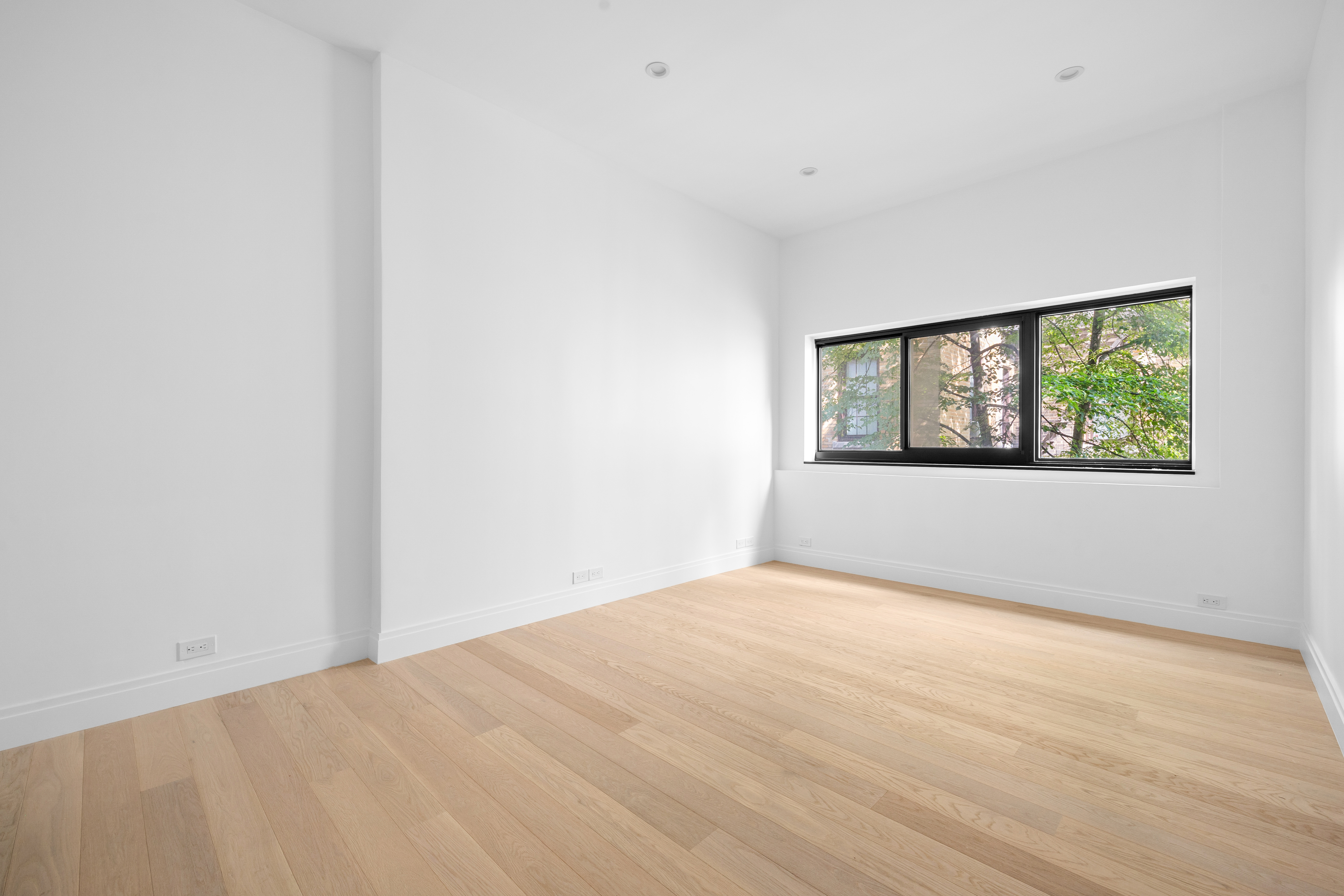 69 Bank Street, Unit 203 Manhattan, NY 10014 - Photo 13 of 23 a view of empty room with window