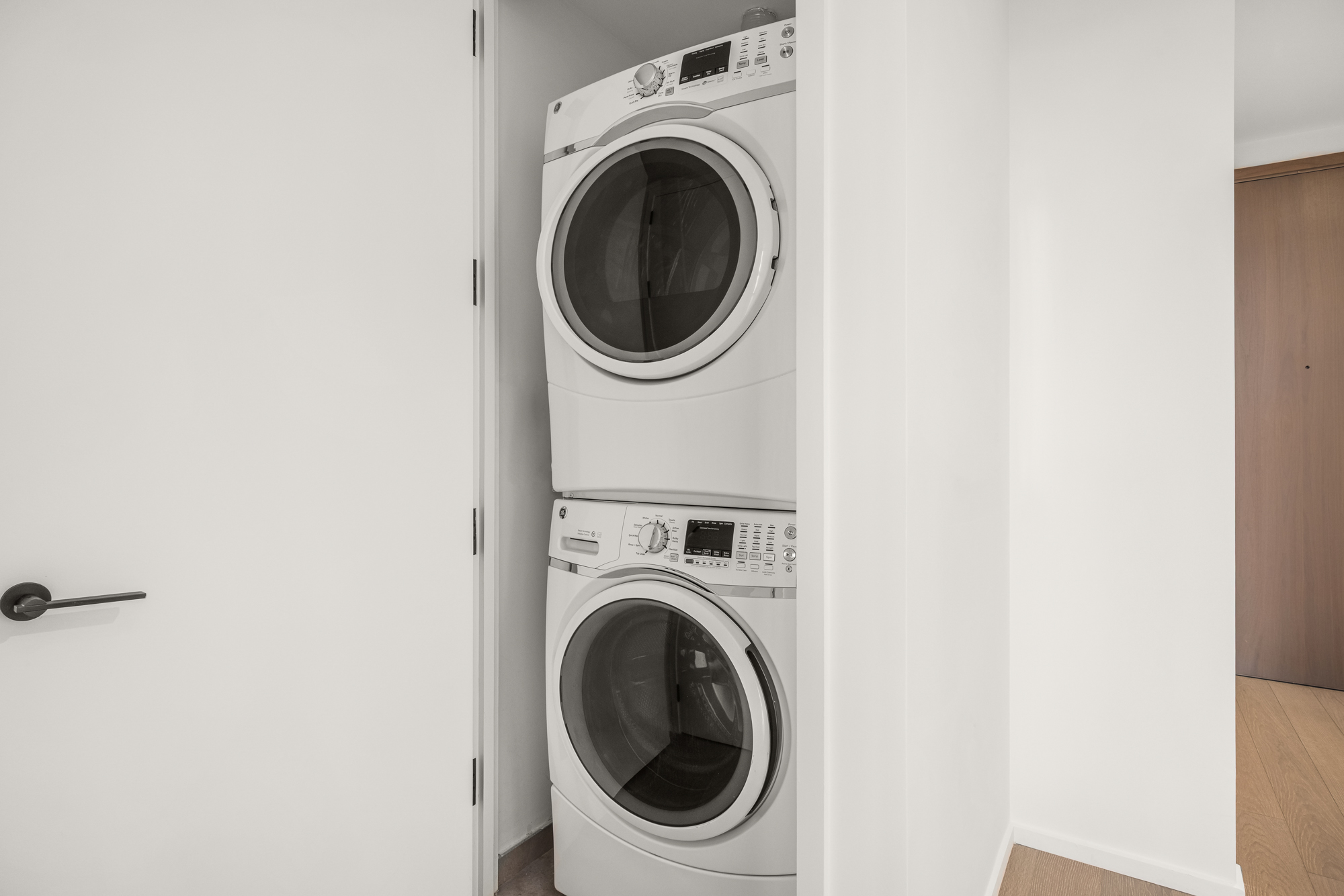 30 Riverside Boulevard, Unit 29B Manhattan, NY 10069 - Photo 19 of 20 a utility room with dryer and washer