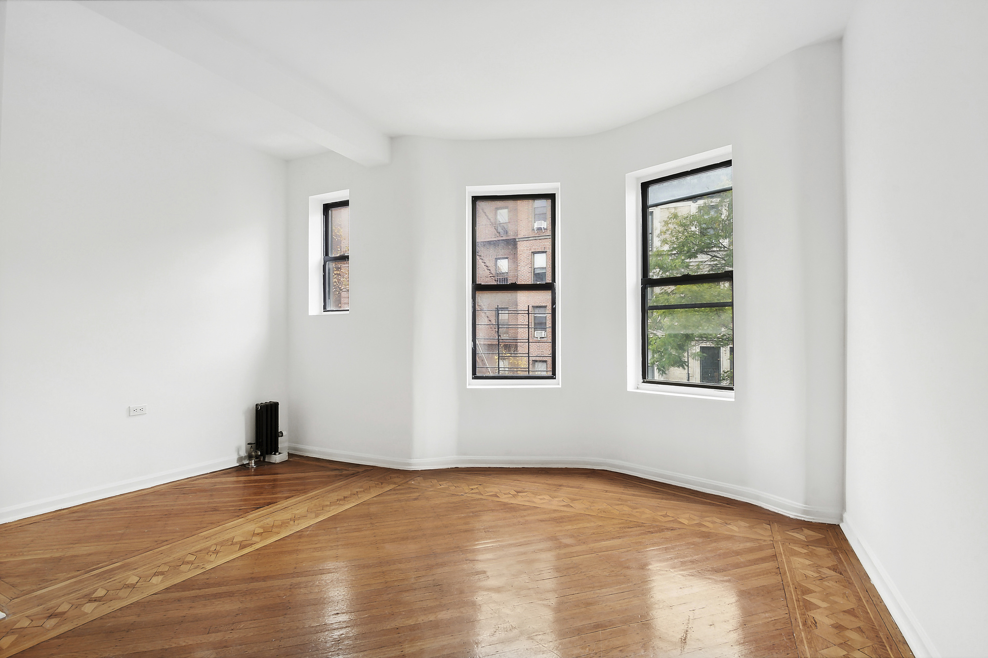 an empty room with windows