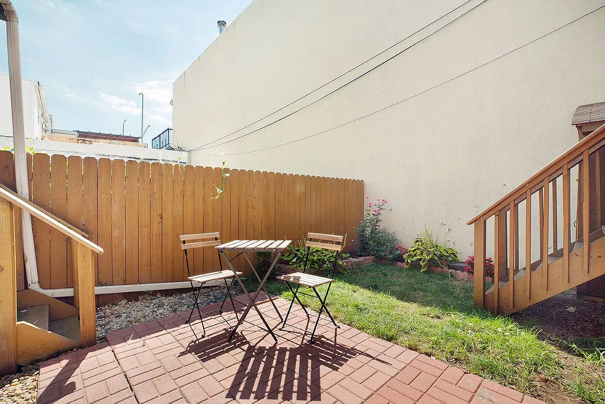 96 Sackman Street Brooklyn, NY 11233 - Photo 9 of 10 a view of a backyard with furniture