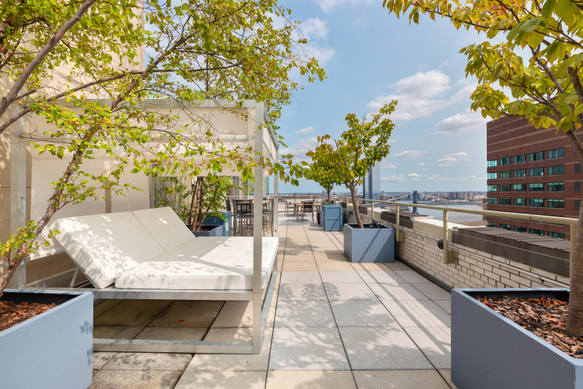 99 John Street, Unit 813 Manhattan, NY 10038 - Photo 13 of 20 a terrace with outdoor seating and city view