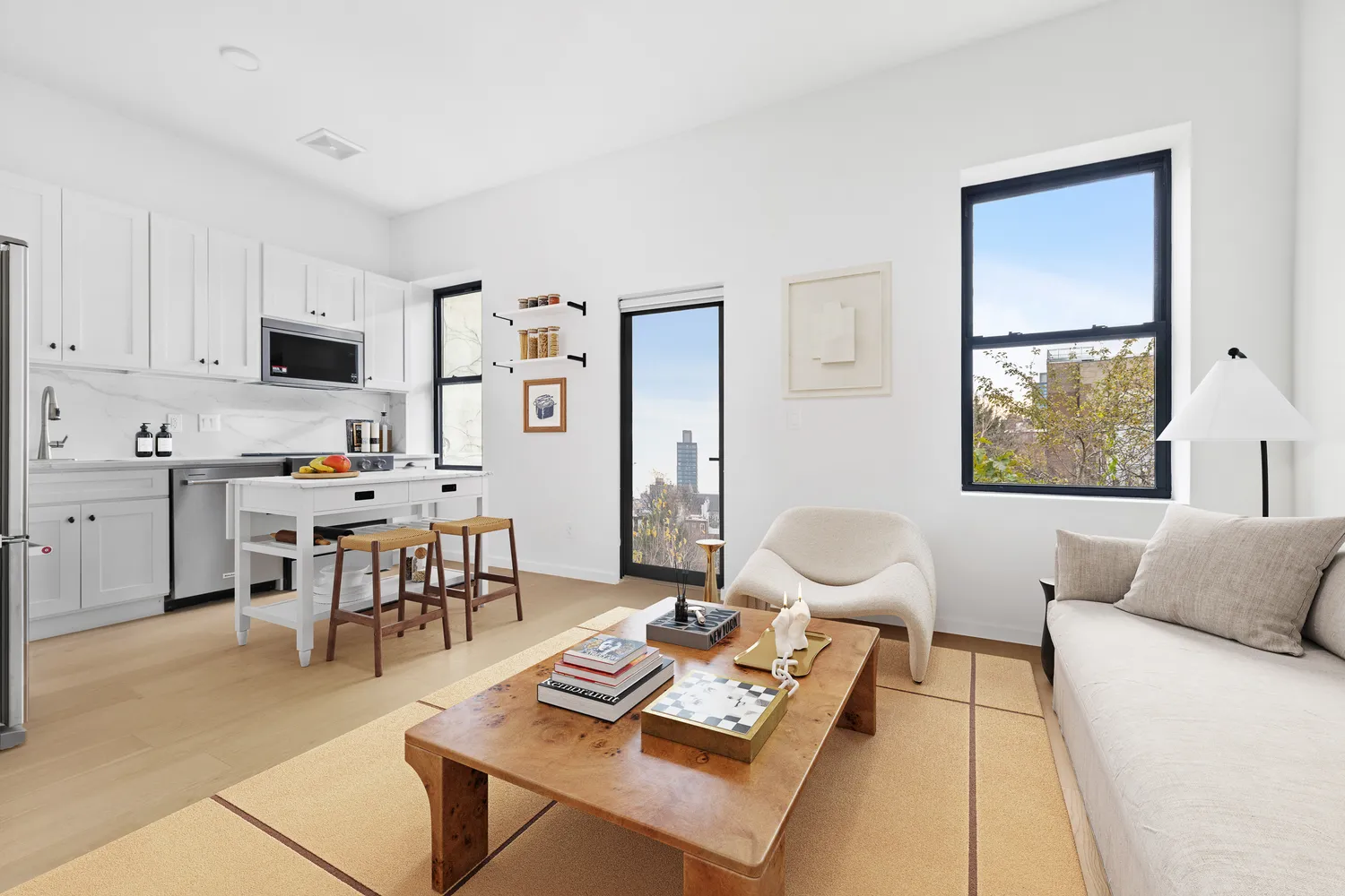 a living room with furniture a rug and a window