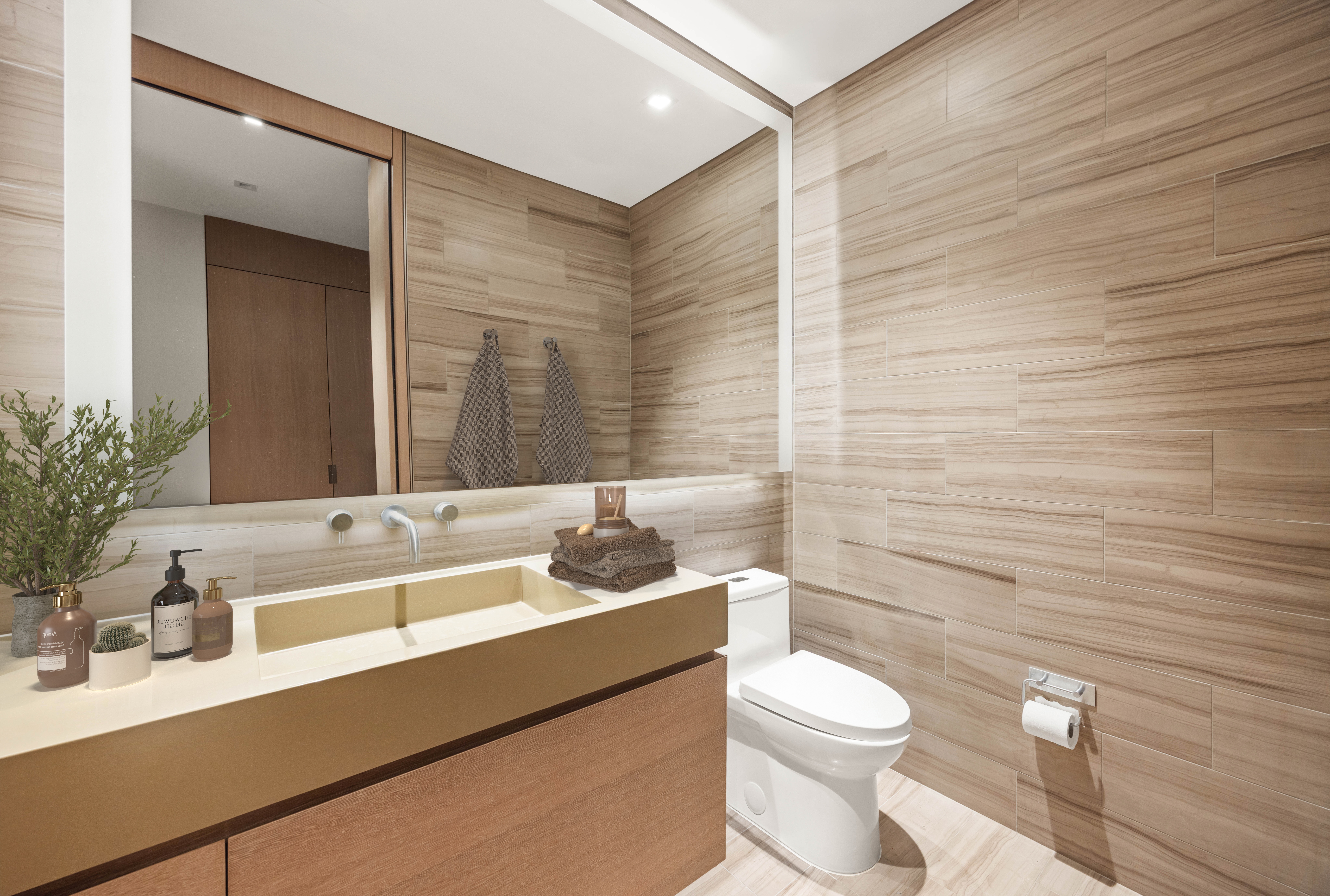 49 Chambers Street, Unit 9G Manhattan, NY 10007 - Photo 6 of 28 a bathroom with a sink a toilet and mirror