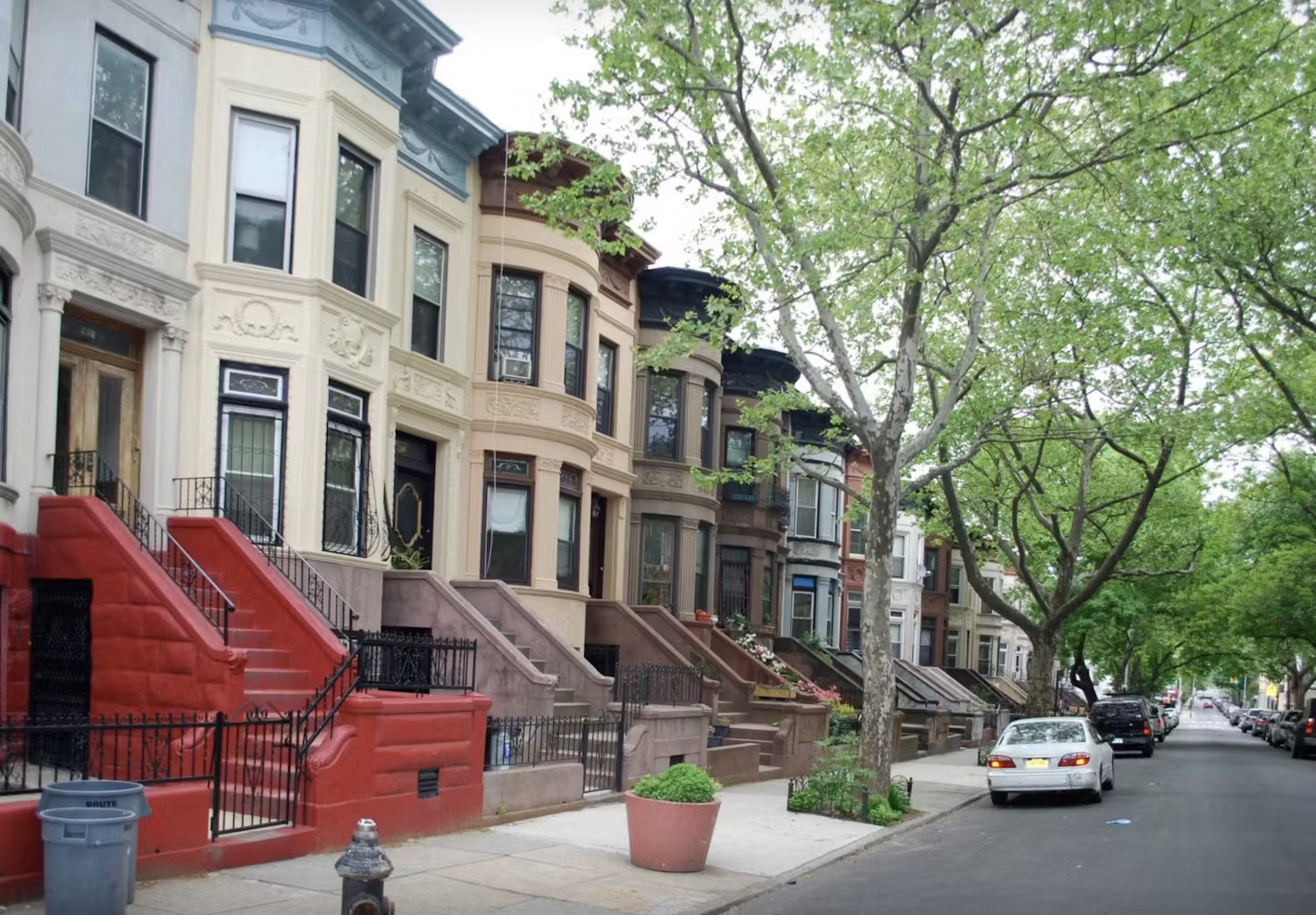 899 Lincoln Place, Unit 1 Brooklyn, NY 11213 - Photo 9 of 9 a couple of cars parked in front of brick building