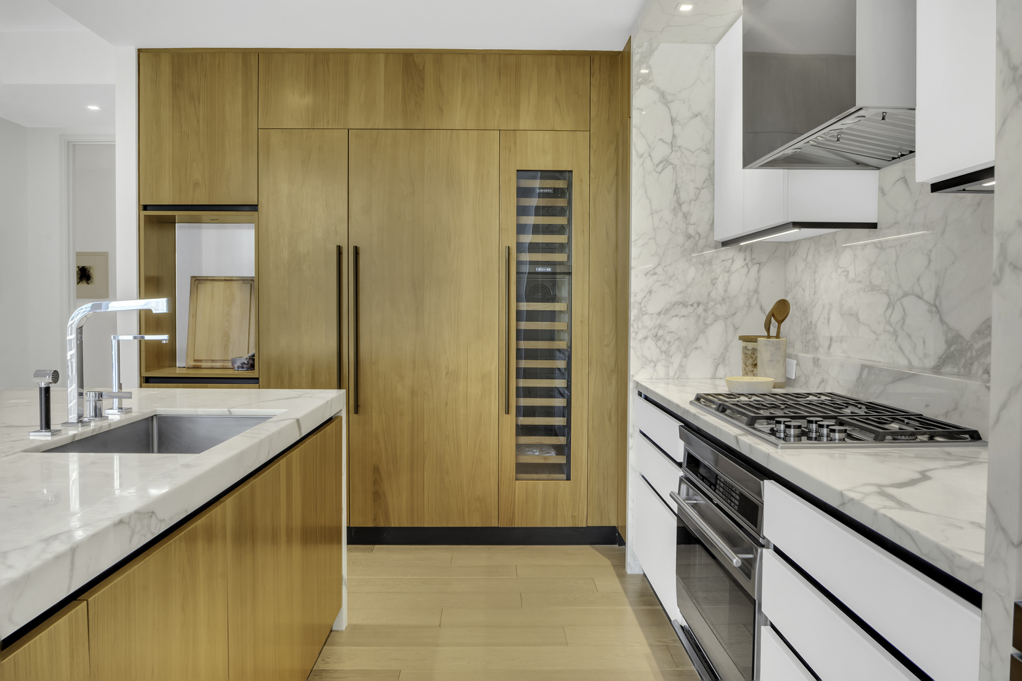 1 West End Avenue, Unit 10A Manhattan, NY 10023 - Photo 7 of 38 a kitchen with stainless steel appliances granite countertop a sink and cabinets