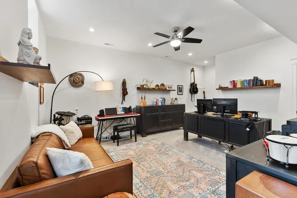 an aerial view of a house with a swimming pool
