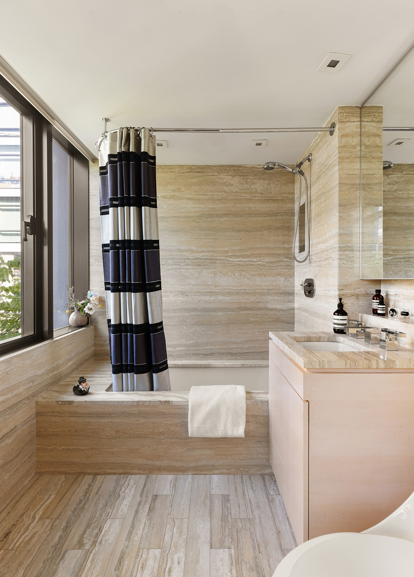 170 East End Avenue, Unit 7A Manhattan, NY 10128 - Photo 11 of 35 a bathroom with a sink a toilet and shower