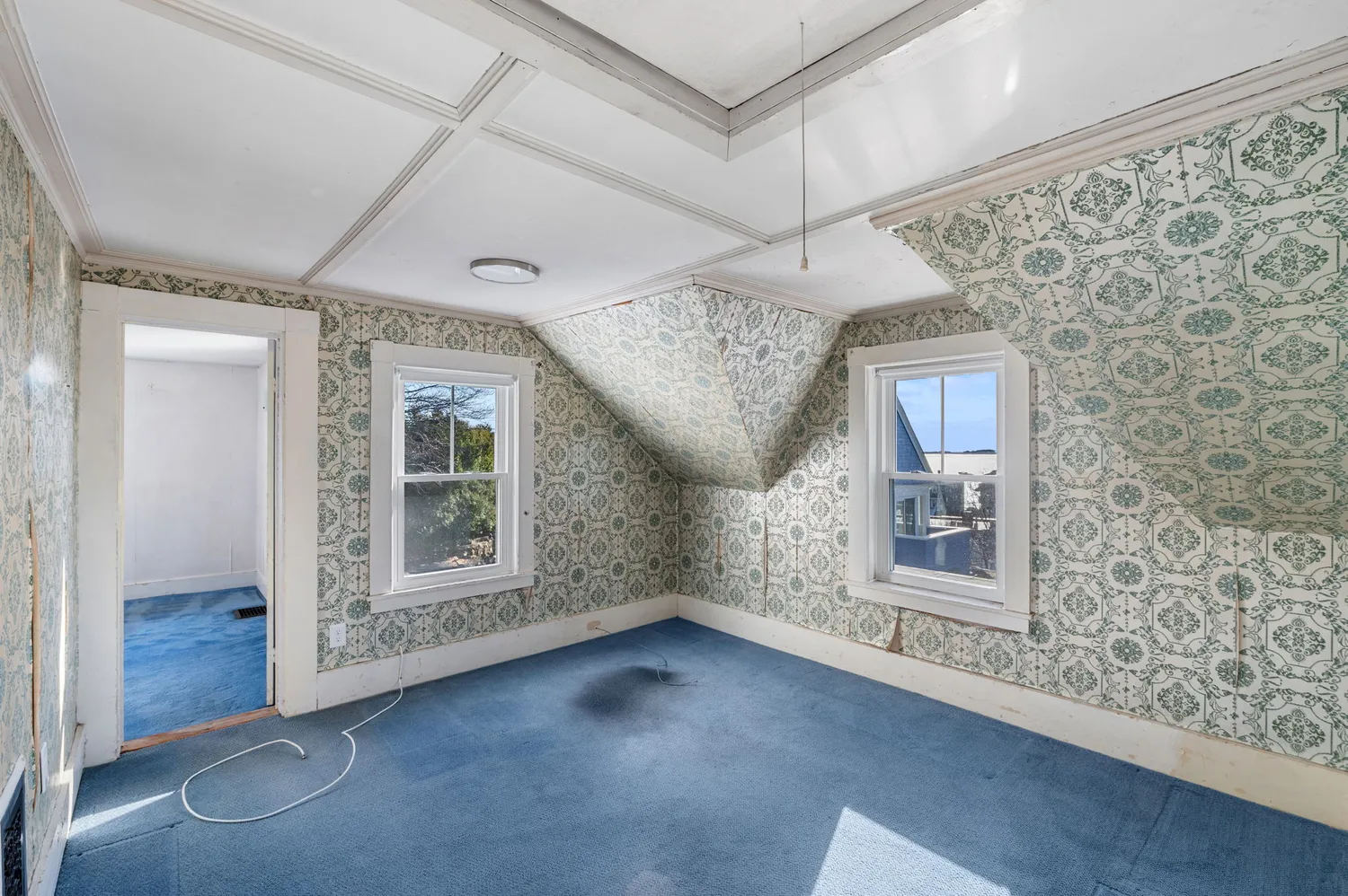 an empty room with windows