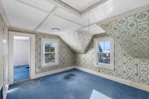 an empty room with windows