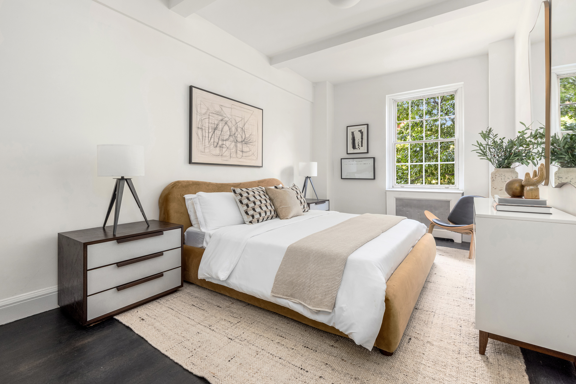 39 5th Avenue, Unit 2B Manhattan, NY 10003 - Photo 9 of 12 a bedroom with a bed and a window