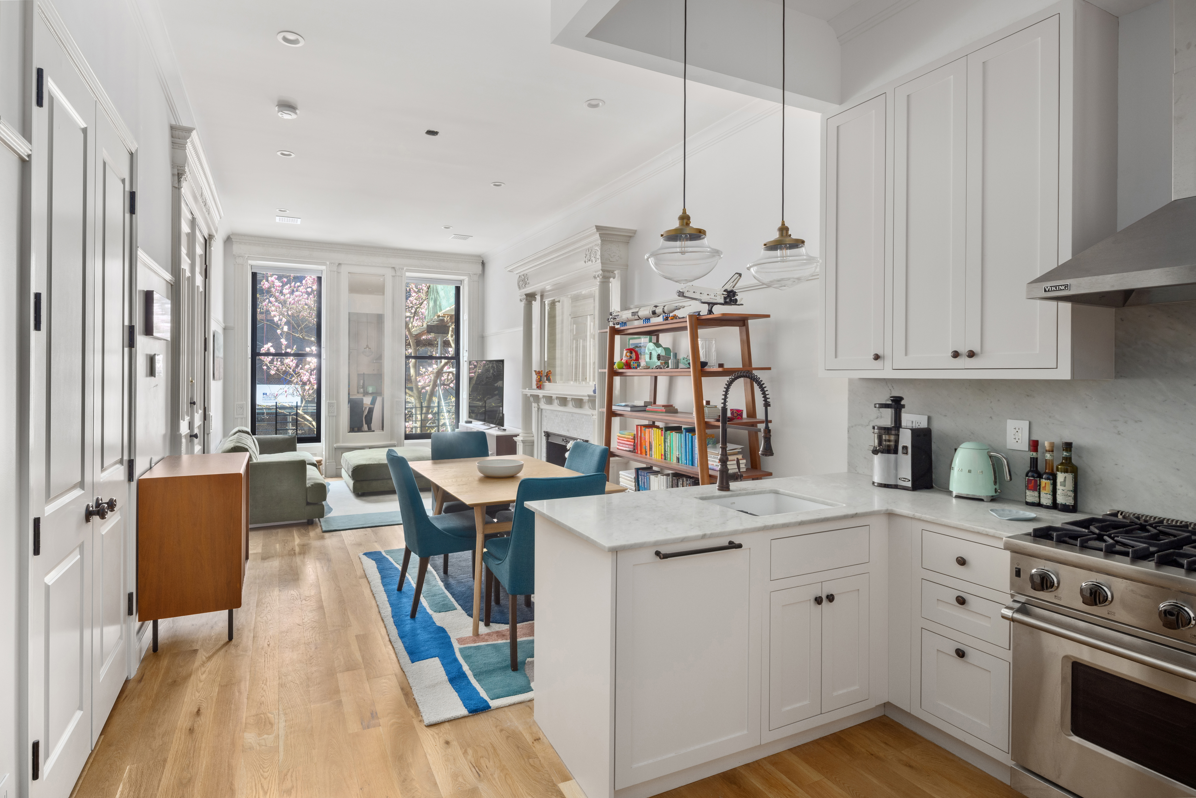 75 8th Avenue, Unit 2 Brooklyn, NY 11215 - Photo 4 of 16 a open kitchen with stainless steel appliances granite countertop a lot of counter space and a wooden floors