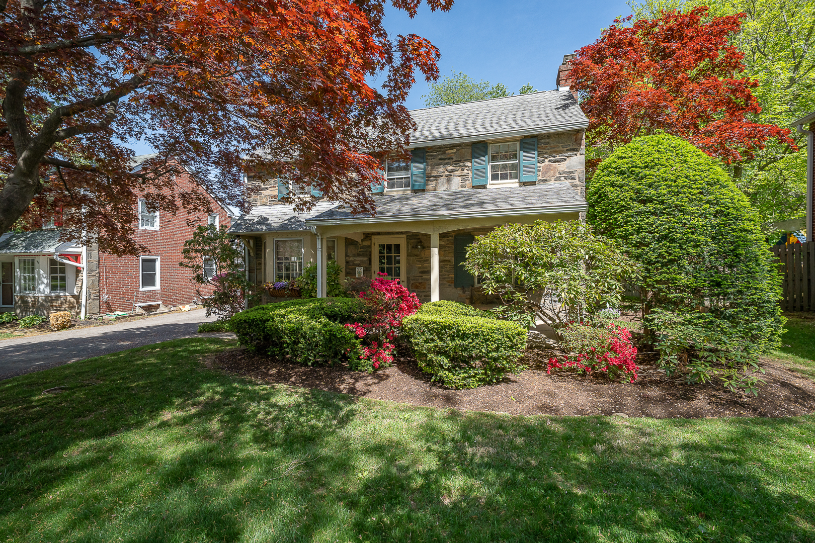 519 Mercer Road Merion Station, PA 19066 - Photo 6 of 58 a view of a house with a yard and garden