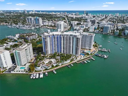 a view of a lake with a city