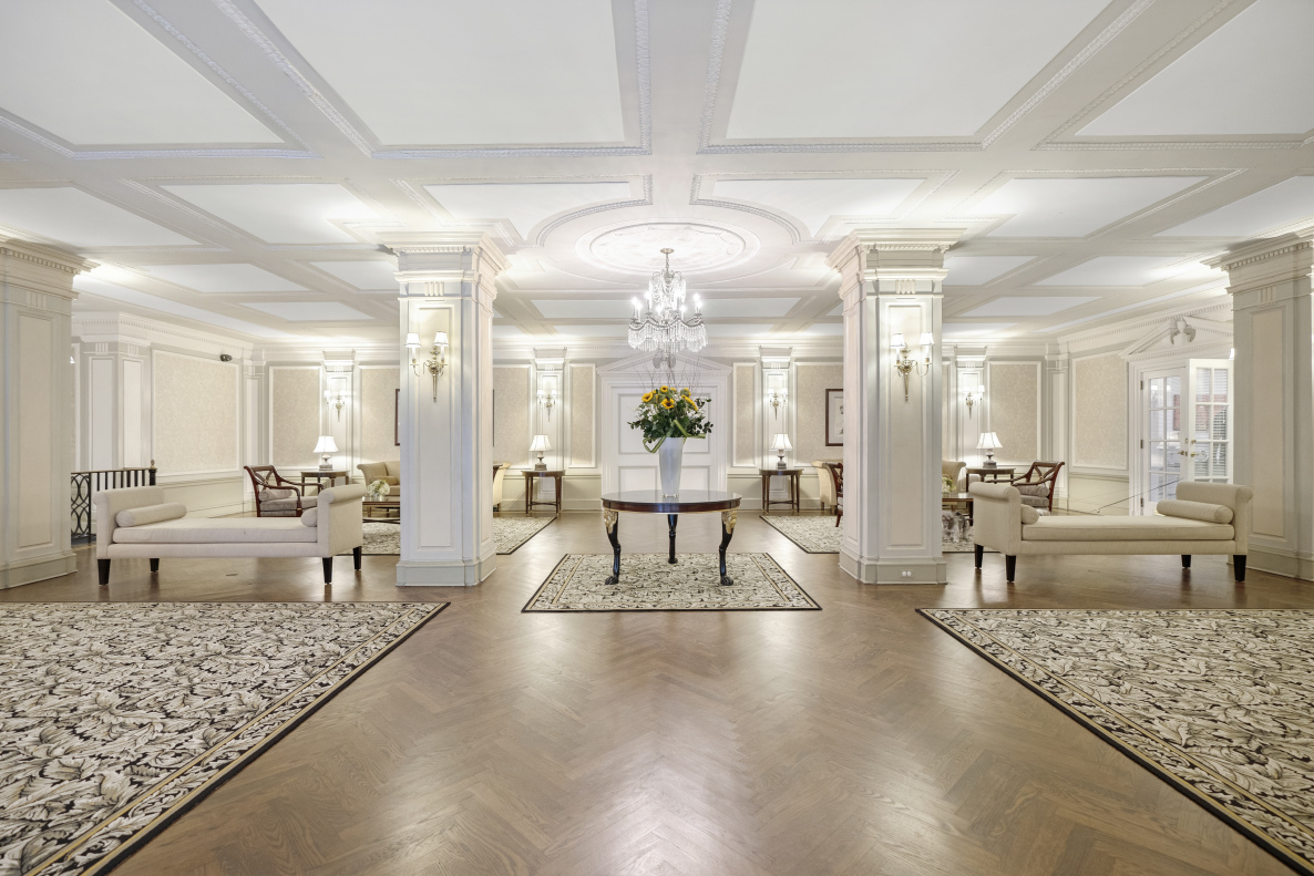 225 Central Park West, Unit 801 Manhattan, NY 10024 - Photo 17 of 21 a living room with furniture and a chandelier
