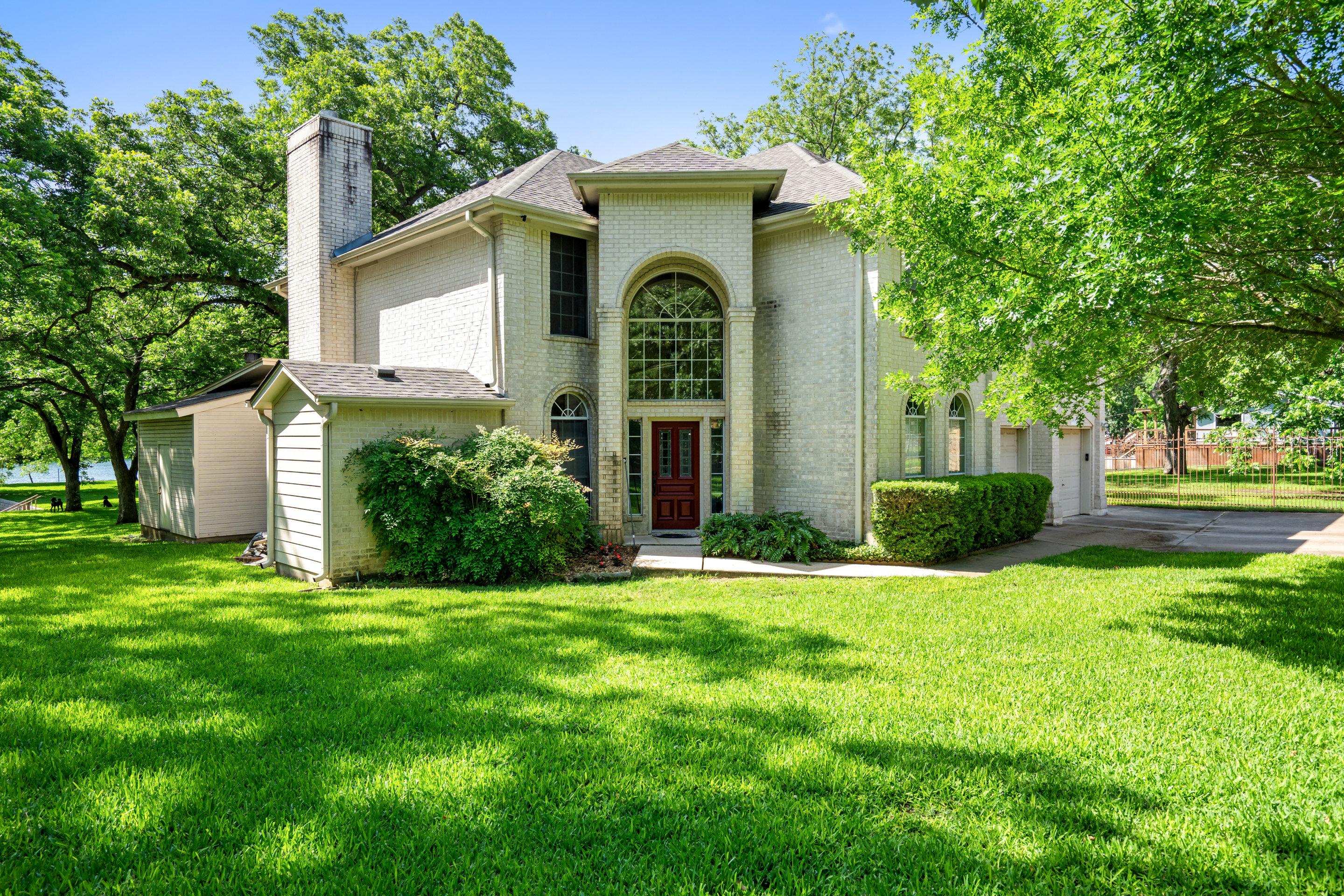 2603 Pearce Road Austin, TX 78730 - Photo 4 of 41 a front view of a house with garden