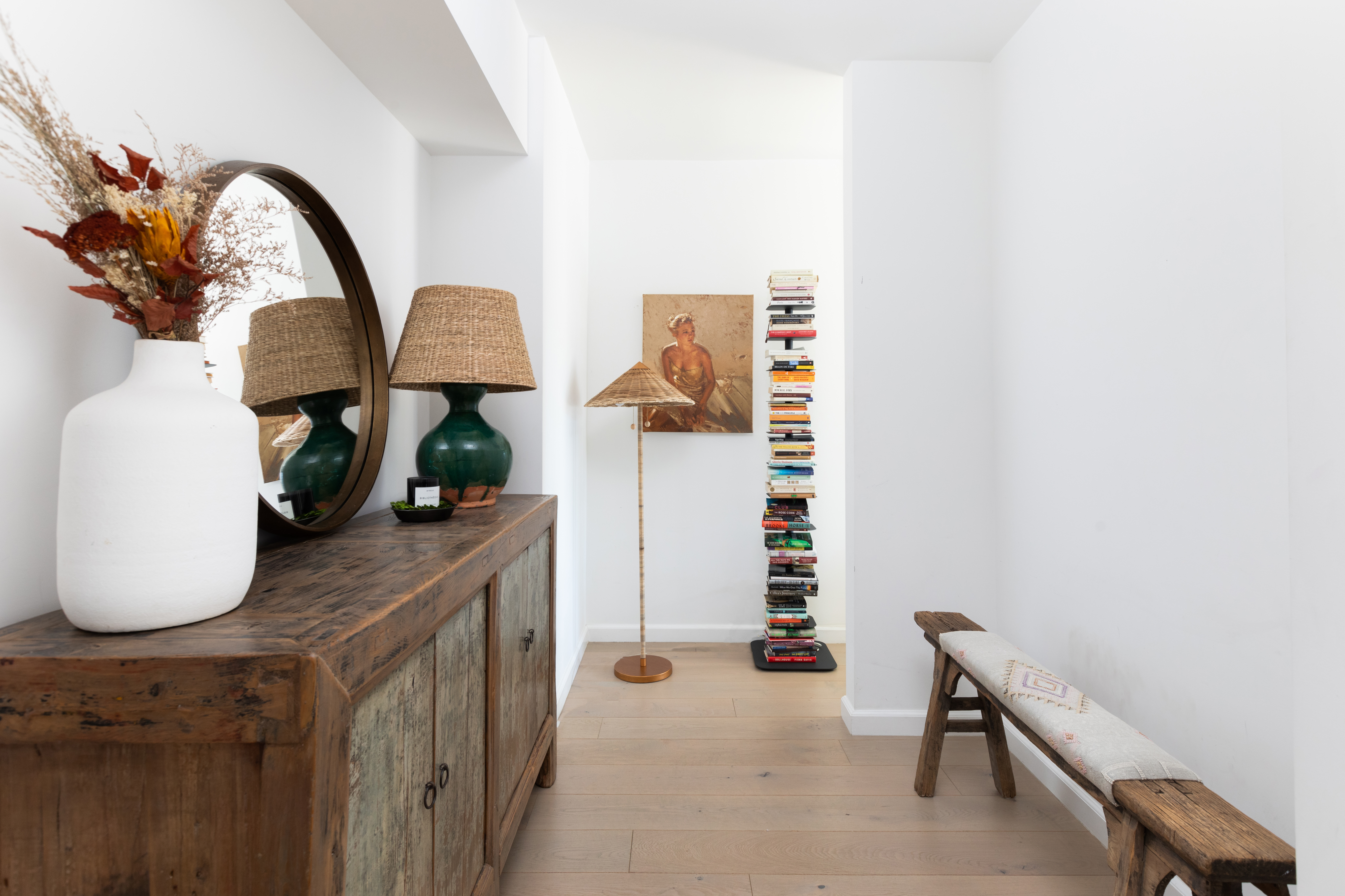 200 East 62nd Street, Unit 10C Manhattan, NY 10065 - Photo 6 of 21 a view of a bathroom with a sink and mirror